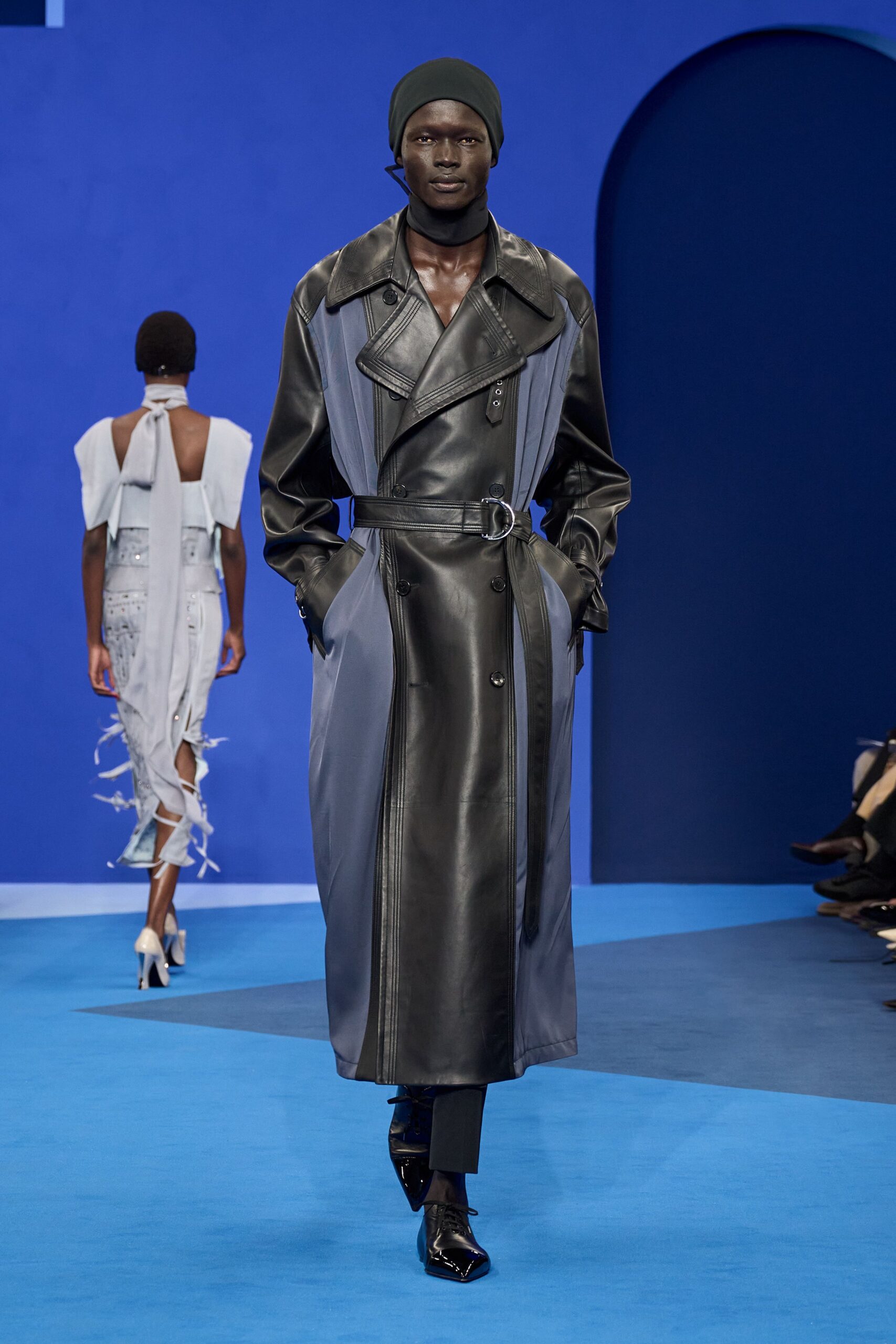 black leather long-sleeve collared fitted zippered belted coat