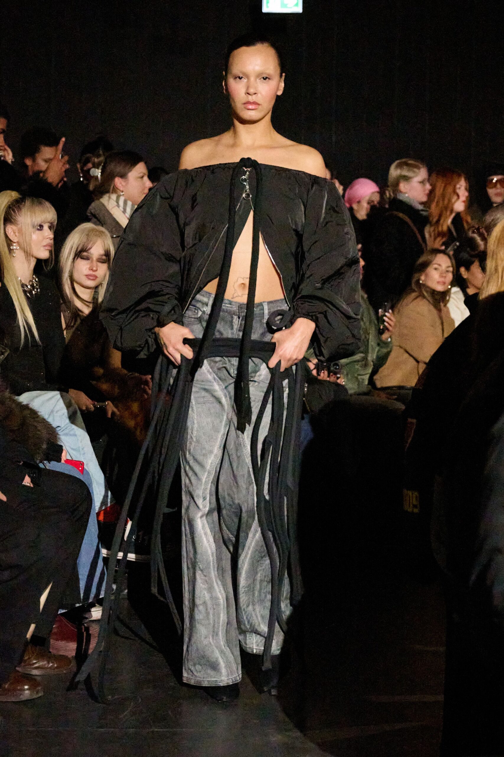 black off-shoulder top and gray wide-leg pants