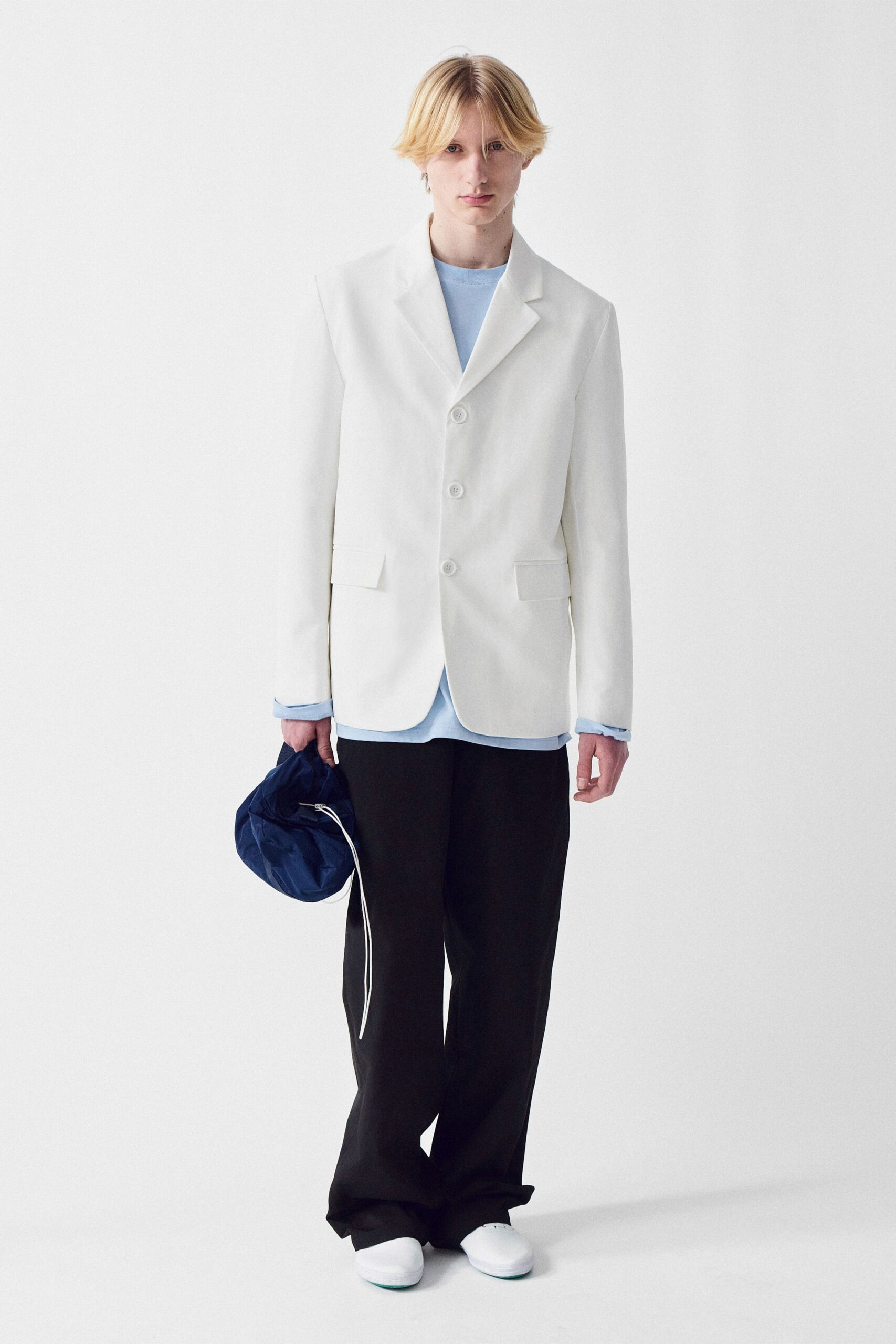 white tailored blazer with blue shirt