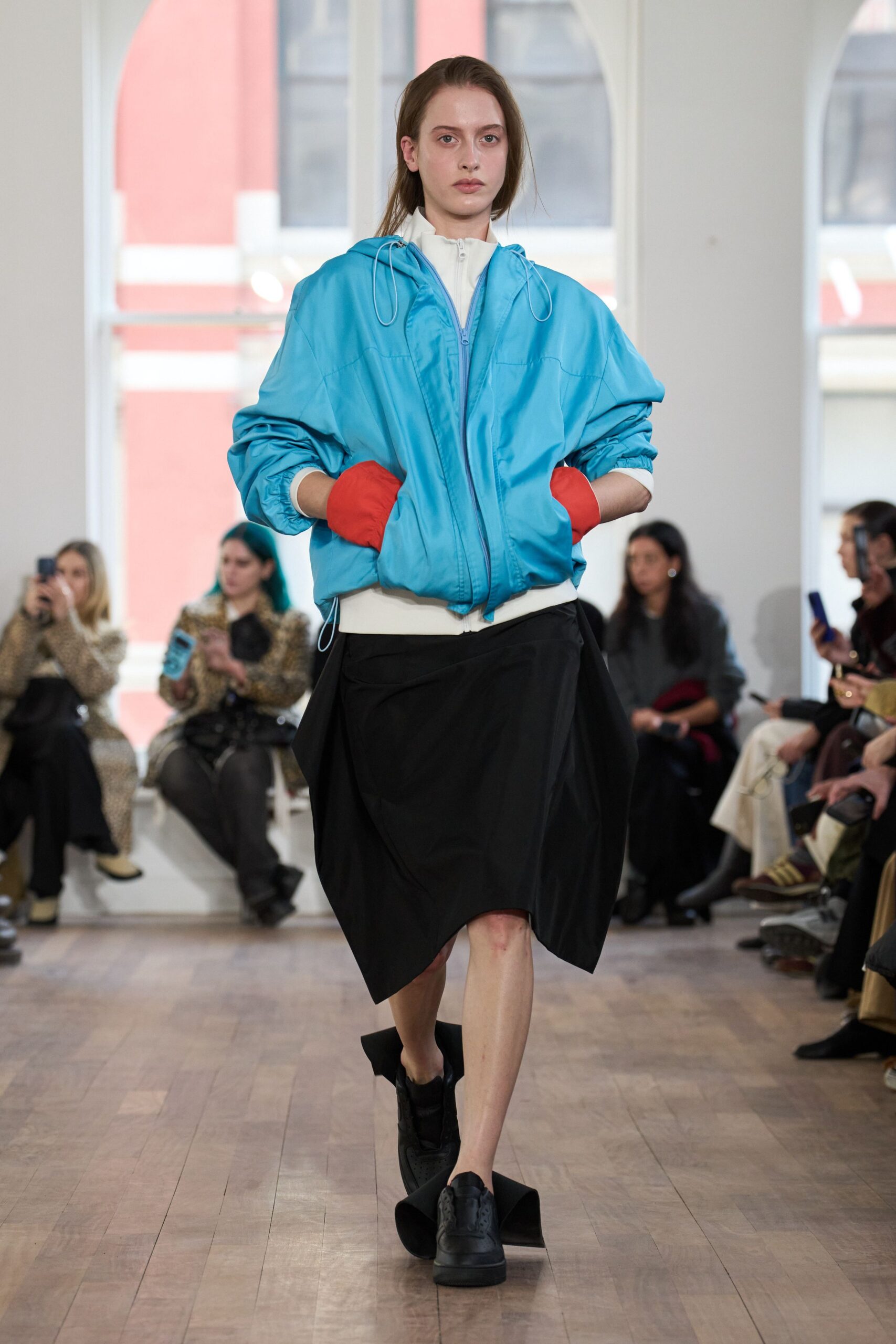 blue oversized jacket with black skirt