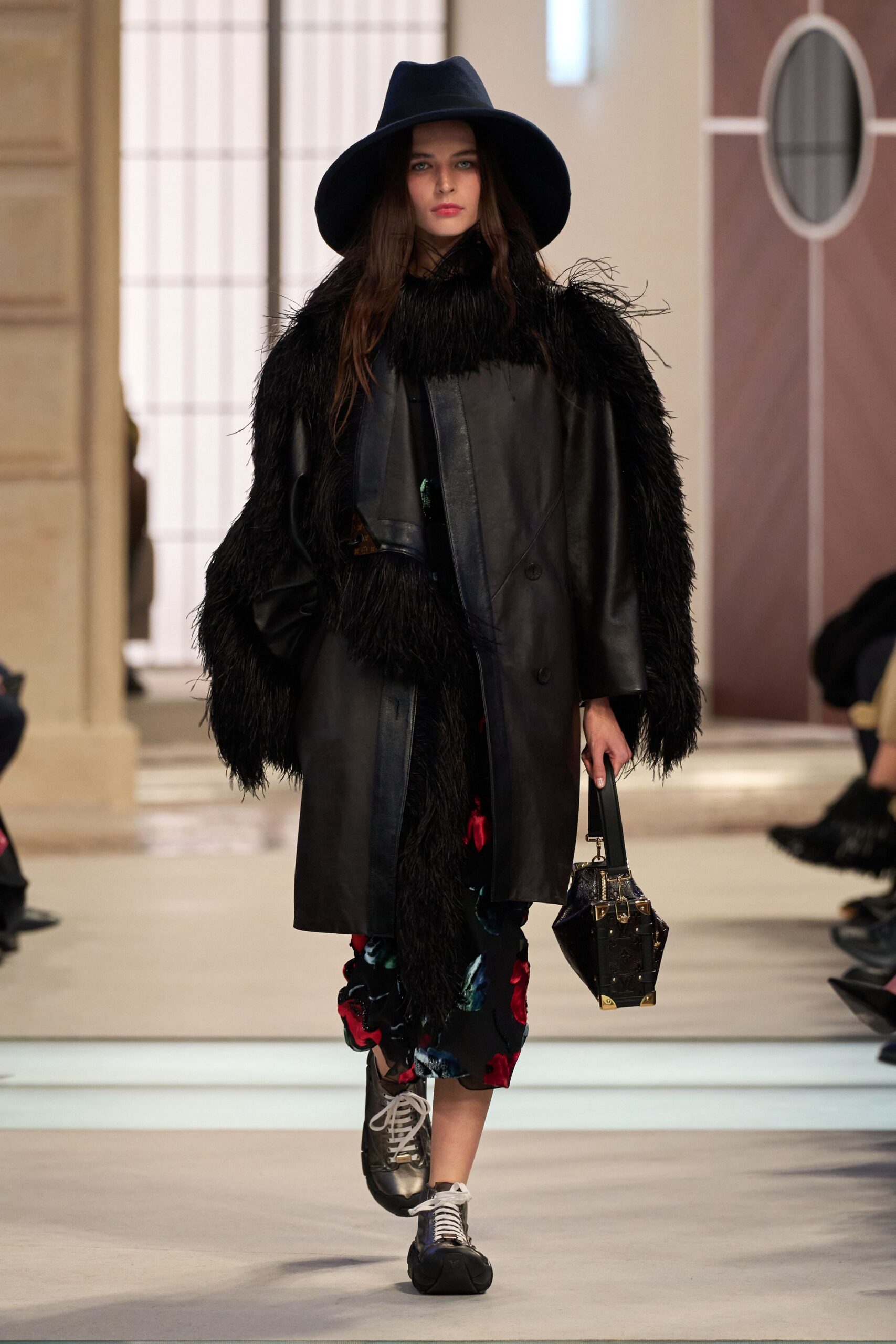 black leather coat with fringes