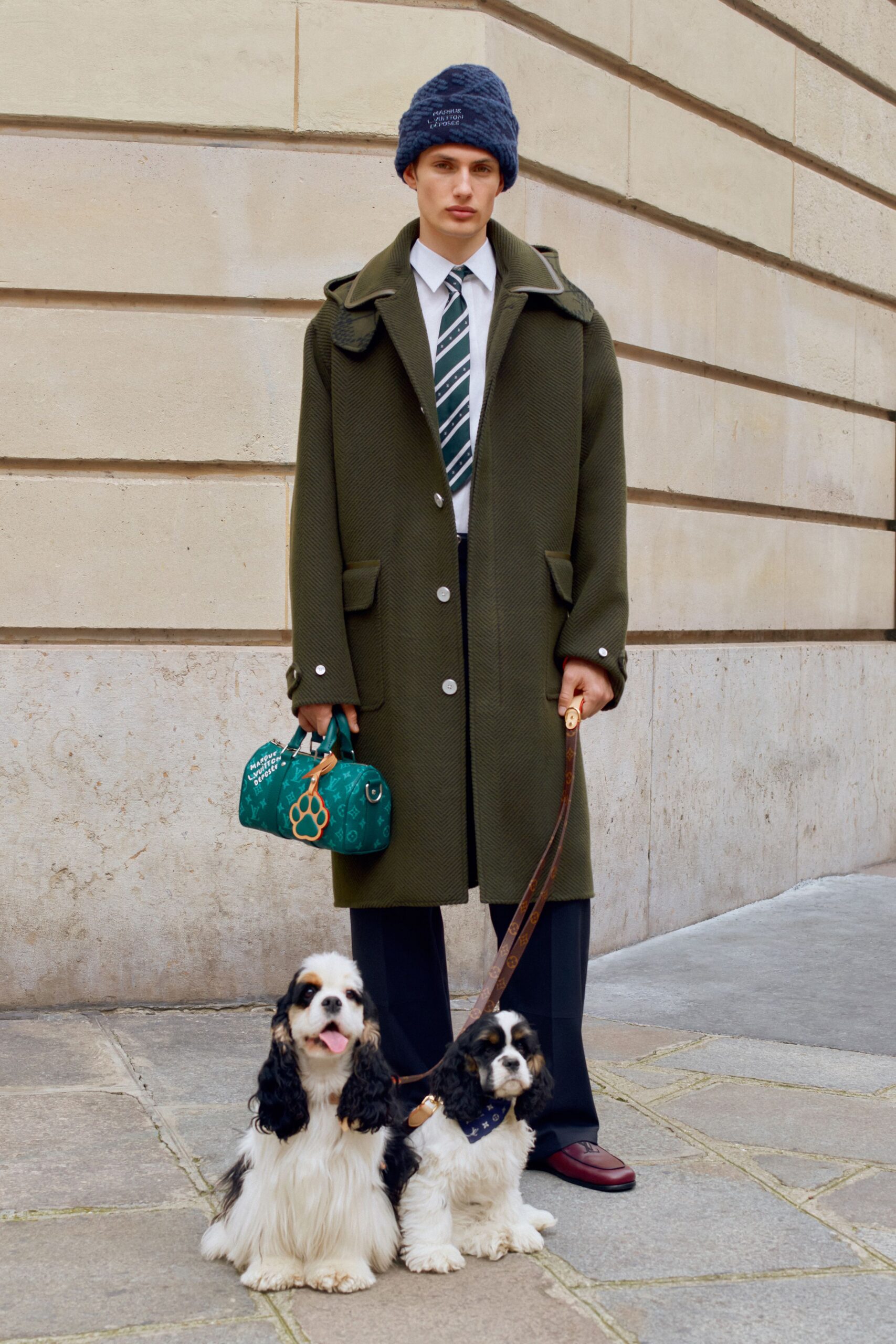 green wool coat with teal bag
