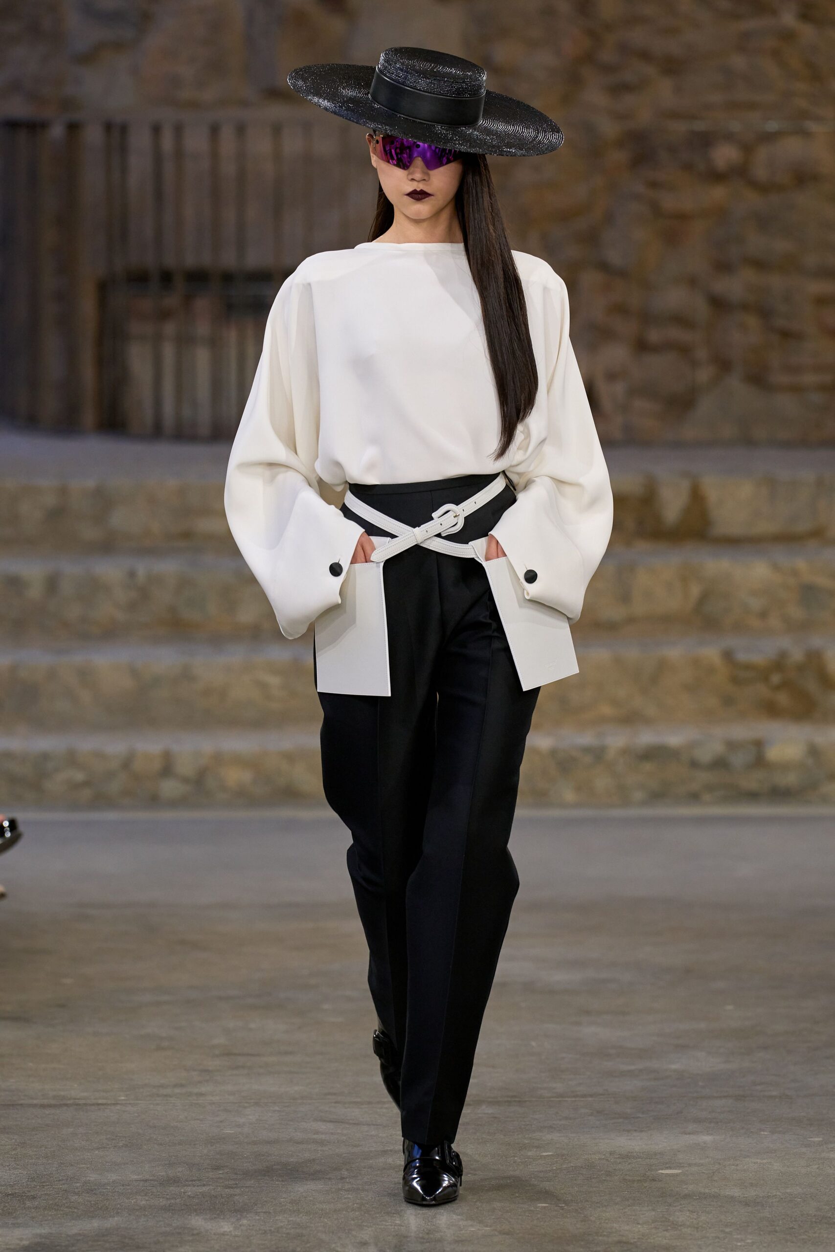 white relaxed top with black pants