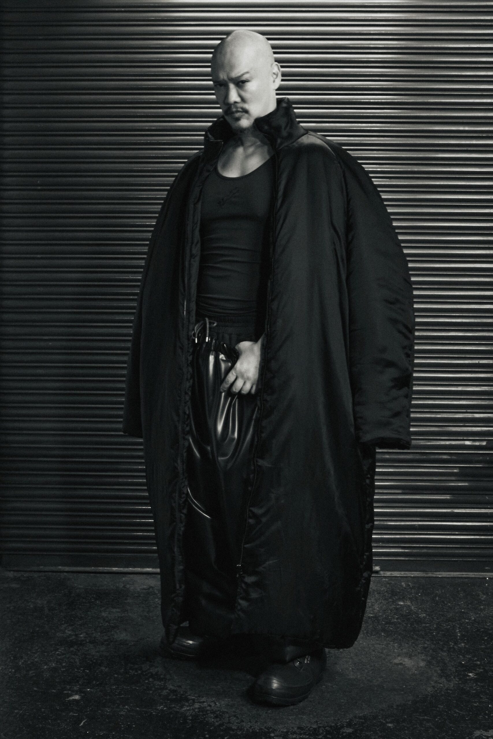 black oversized coat and tank-top