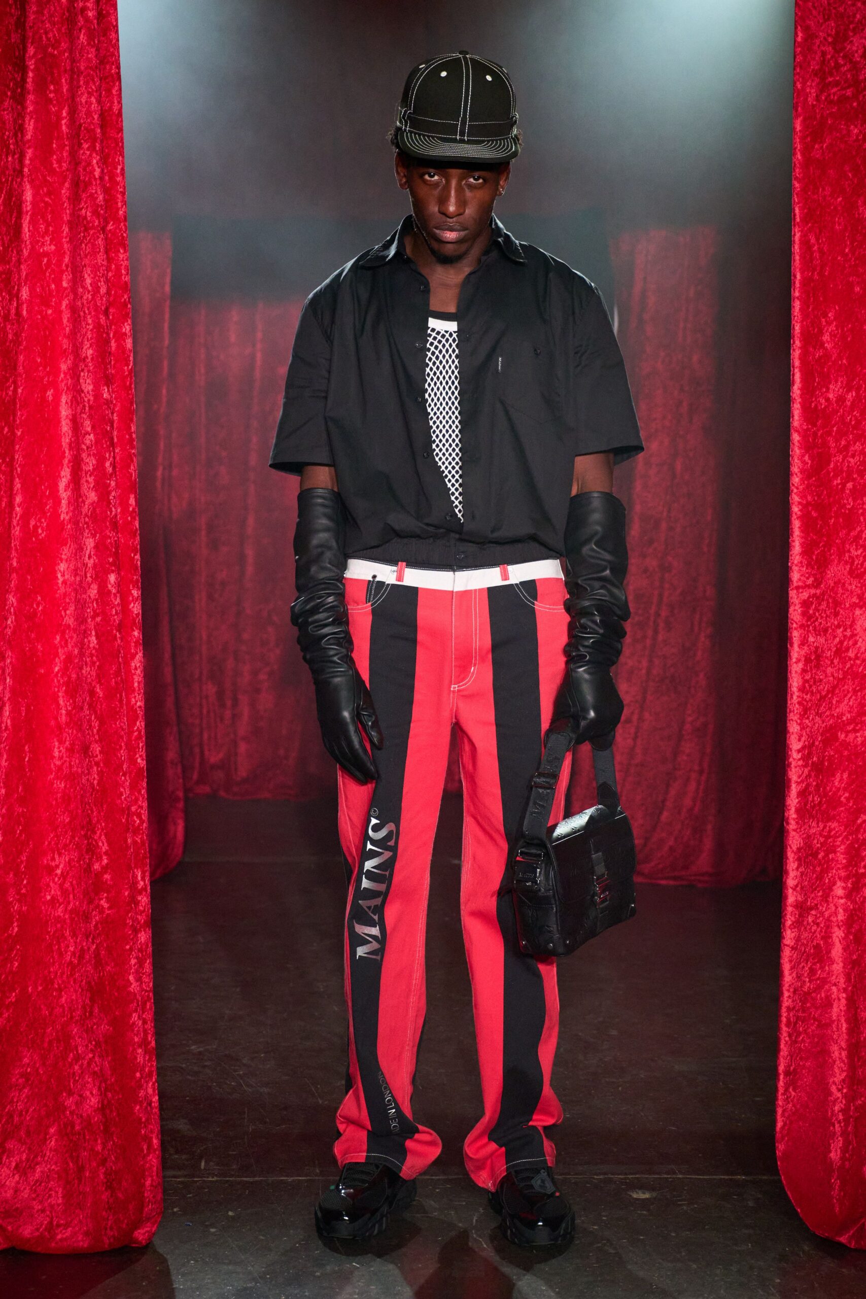 black shirt red striped pants