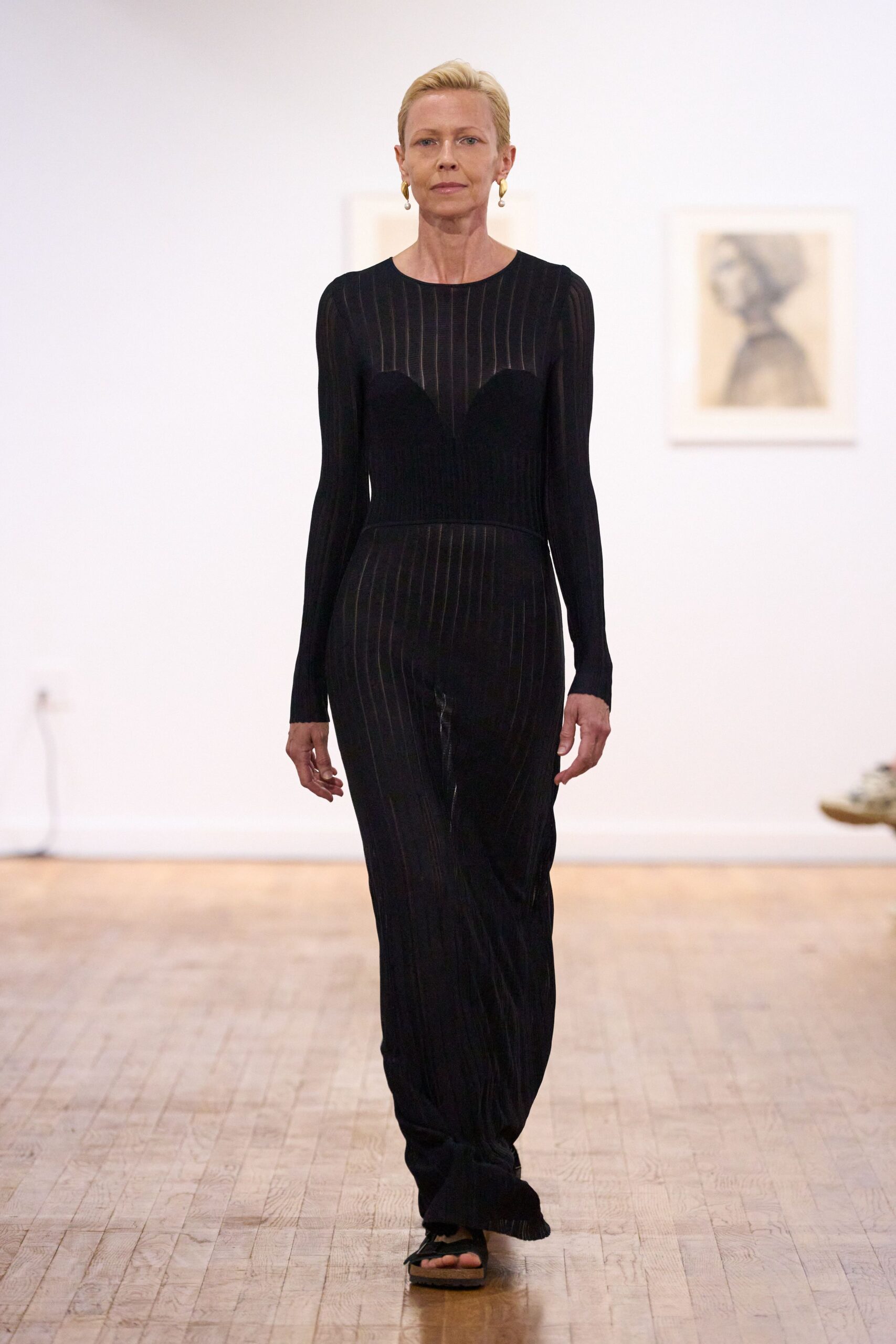 black fitted striped catsuit with sandals