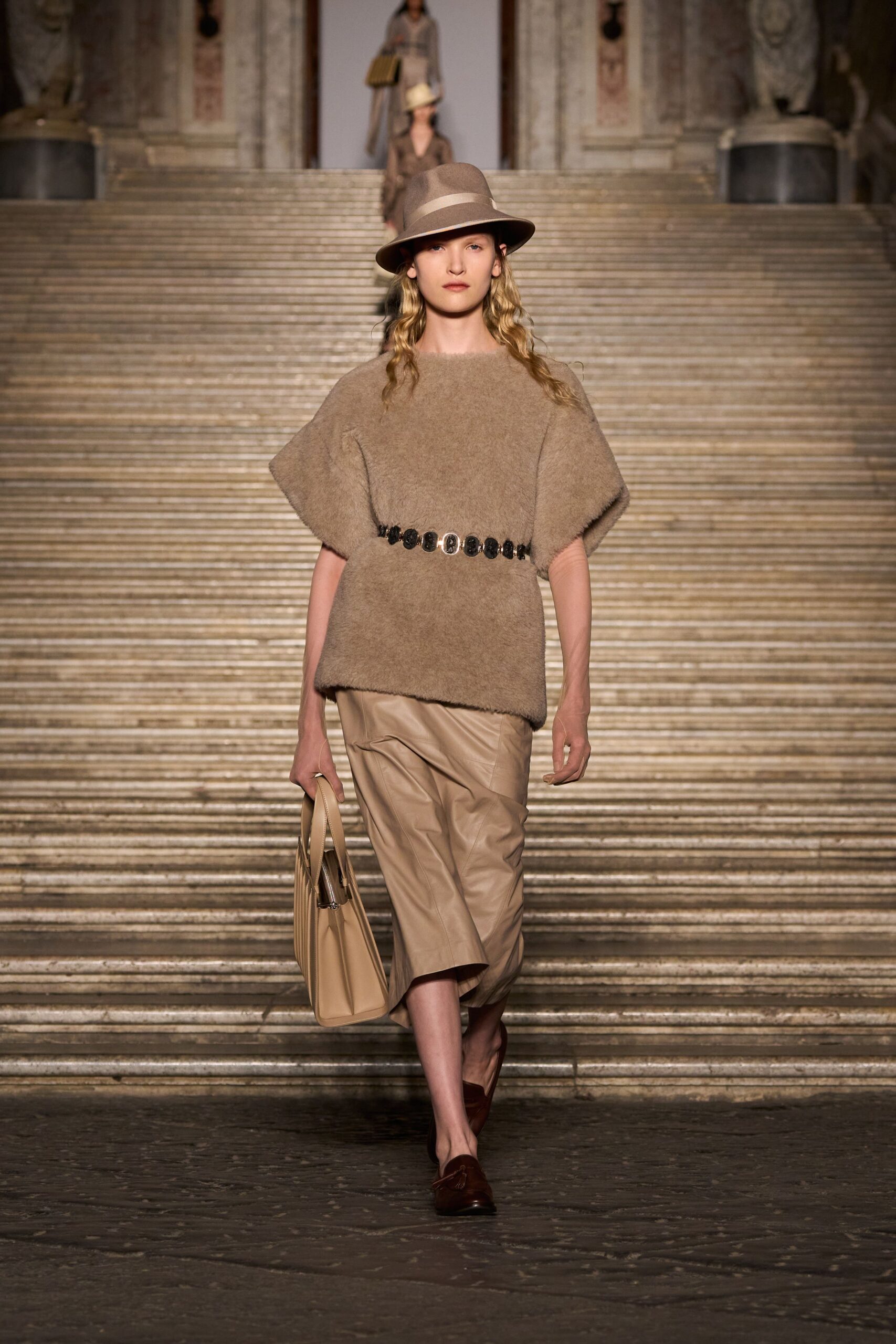 beige wool top and tan leather skirt