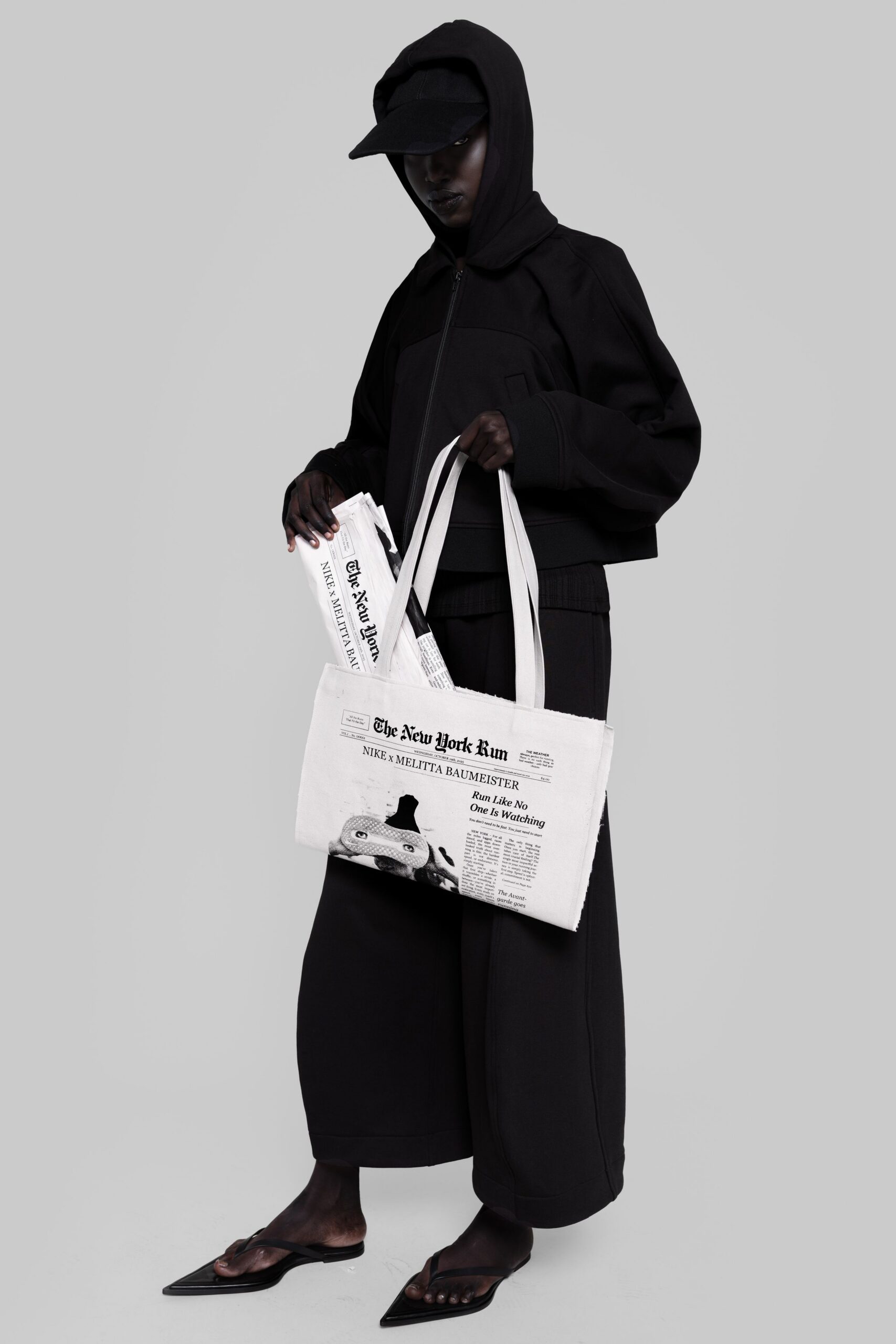 black hoodie and wide-leg pants