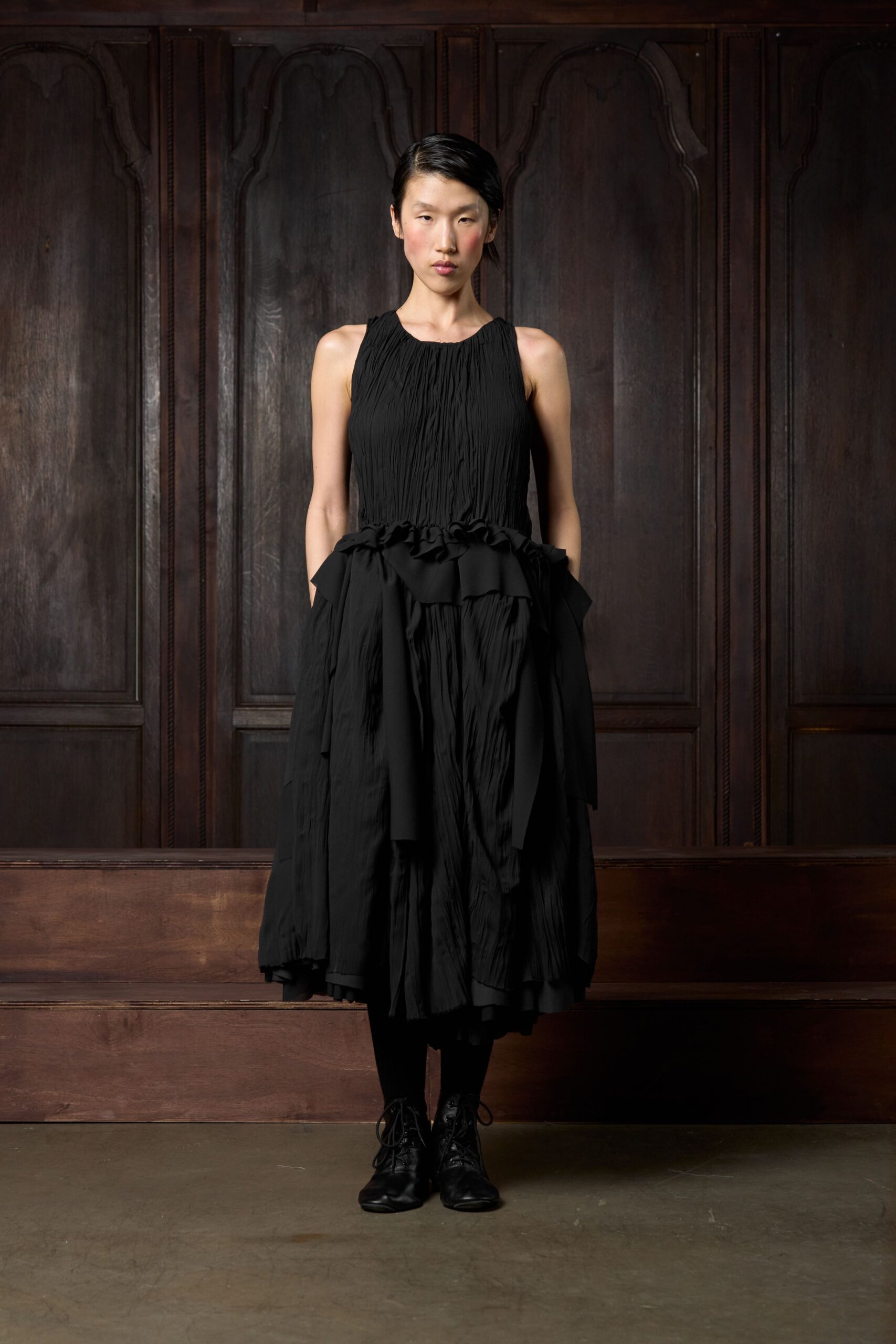 black pleated midi dress with boots