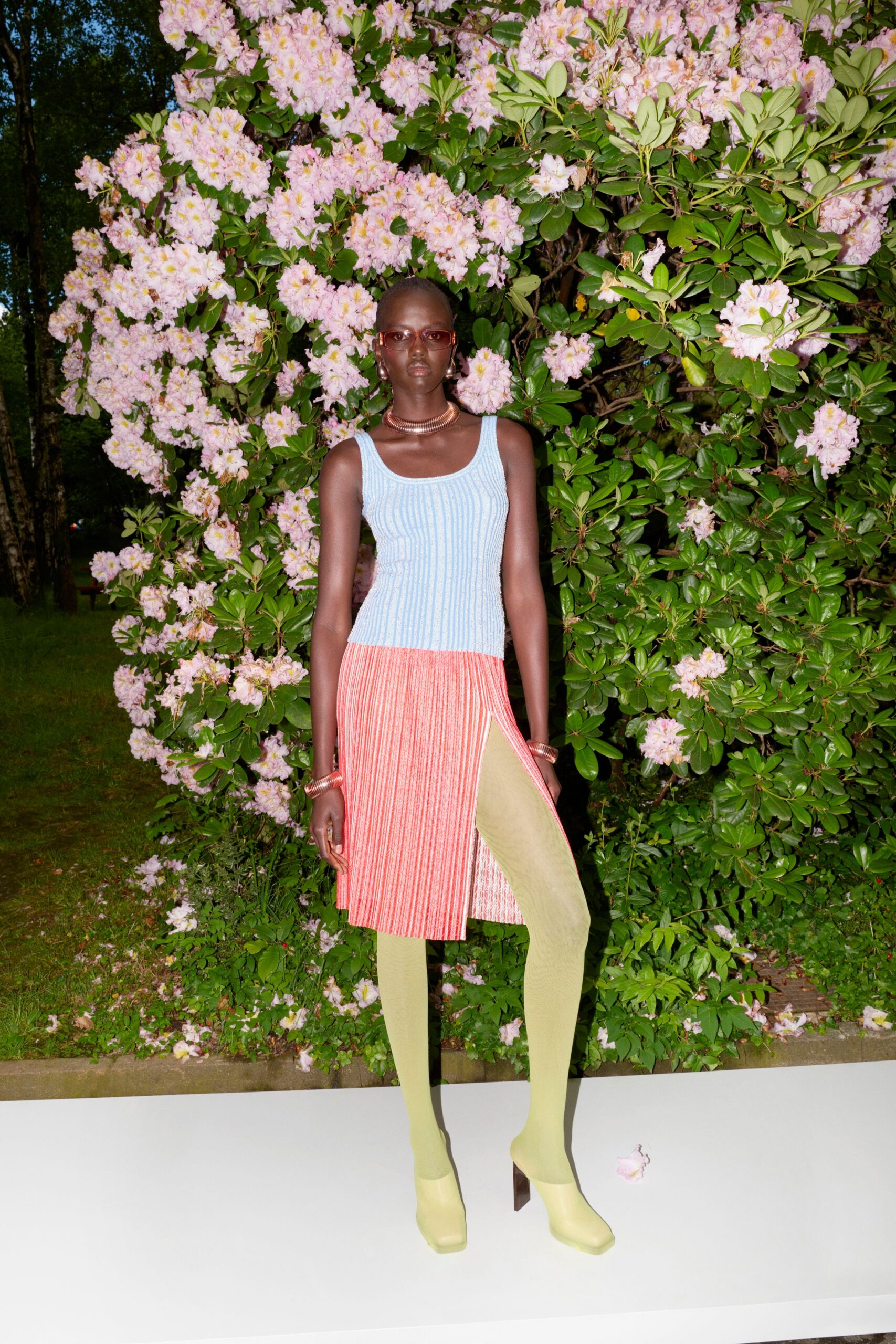 red cotton slit fitted high-waisted pleated skirt