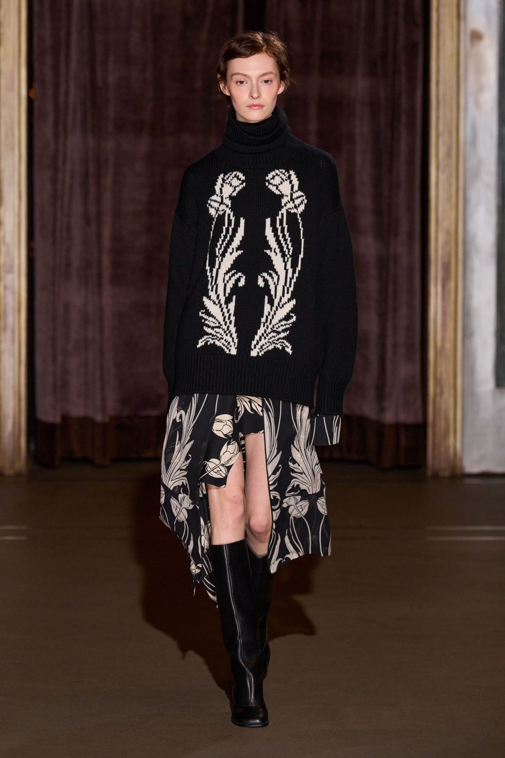black oversized sweater with embroidered skirt