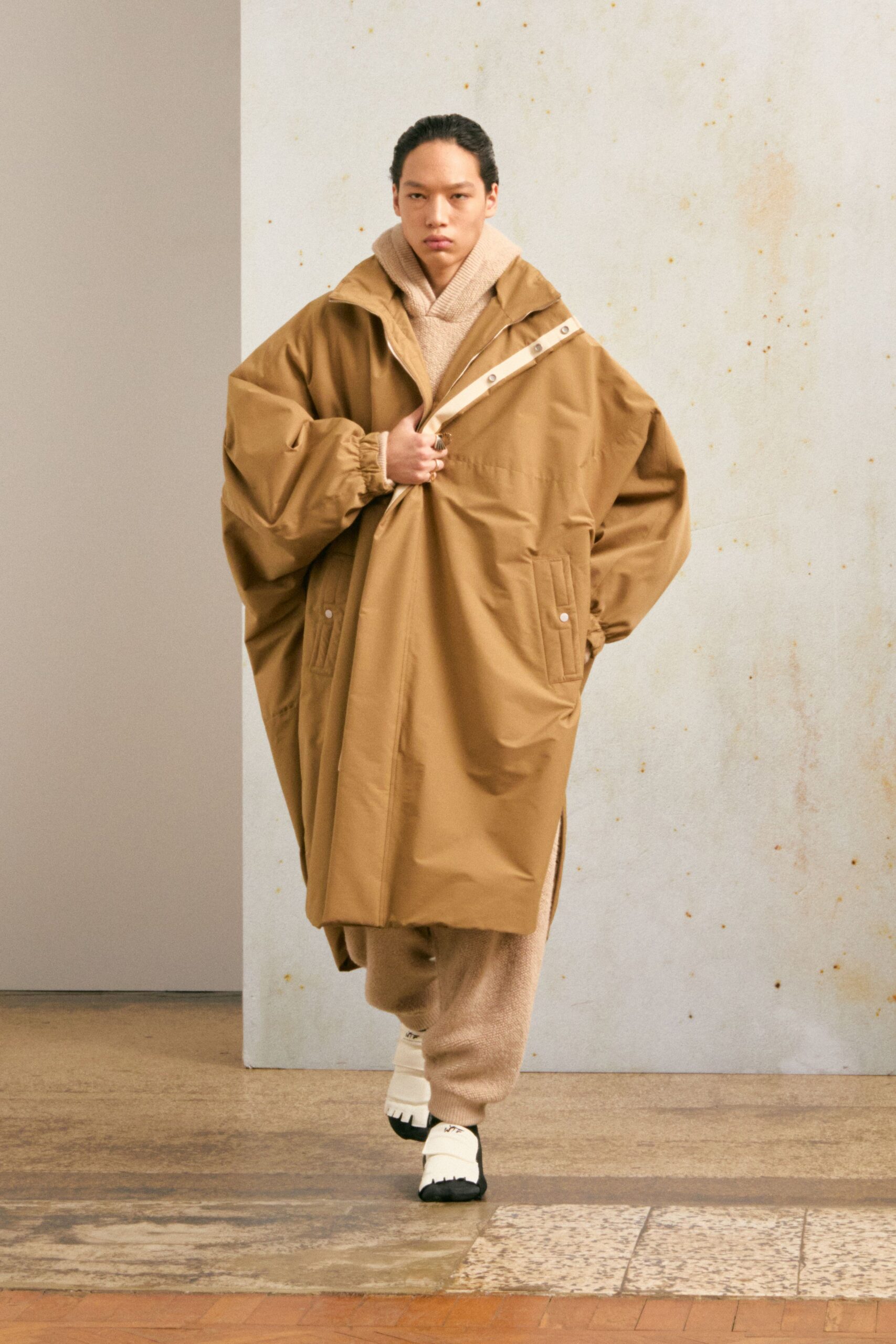 brown oversized coat with beige pants