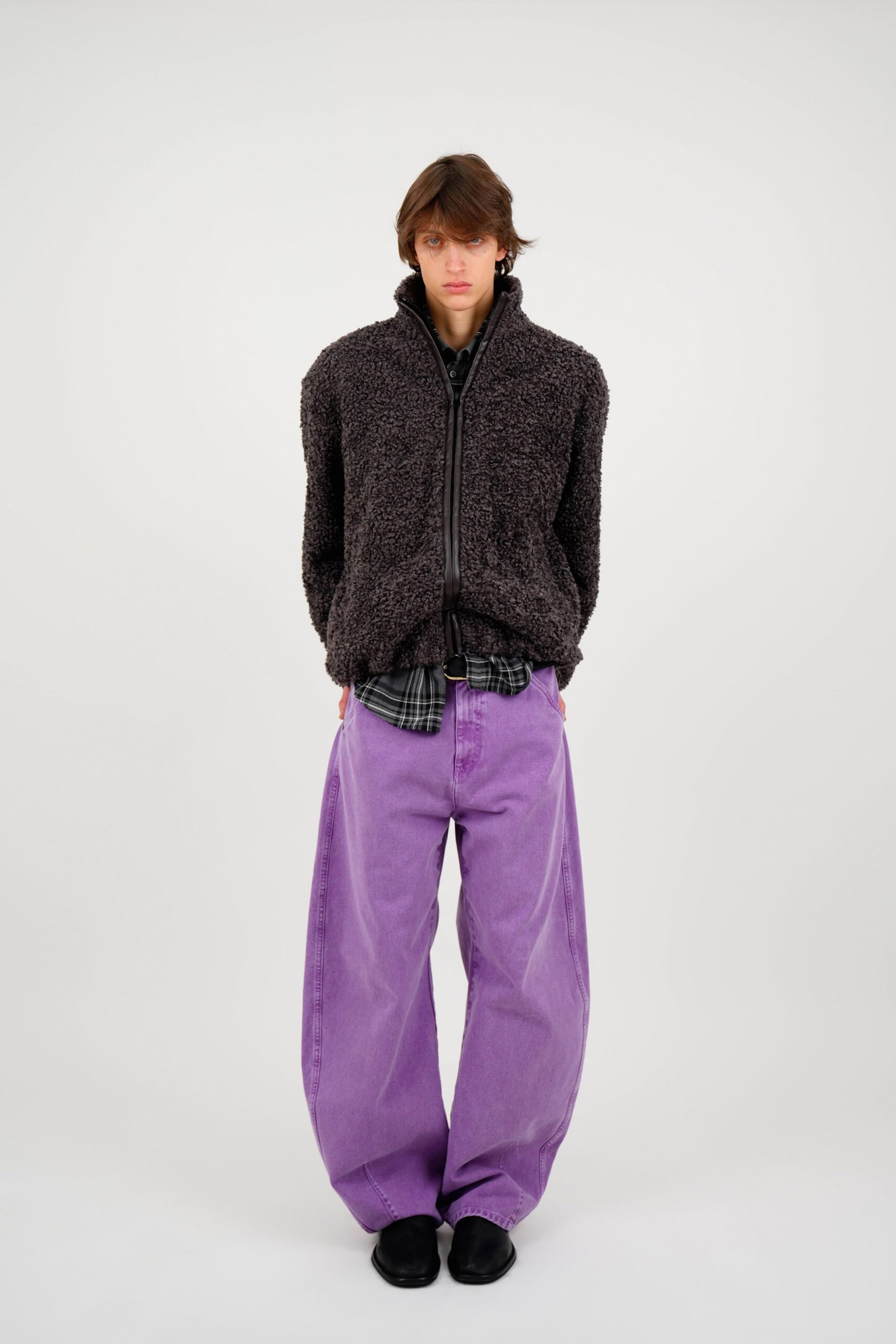 black faux-fur jacket with purple pants