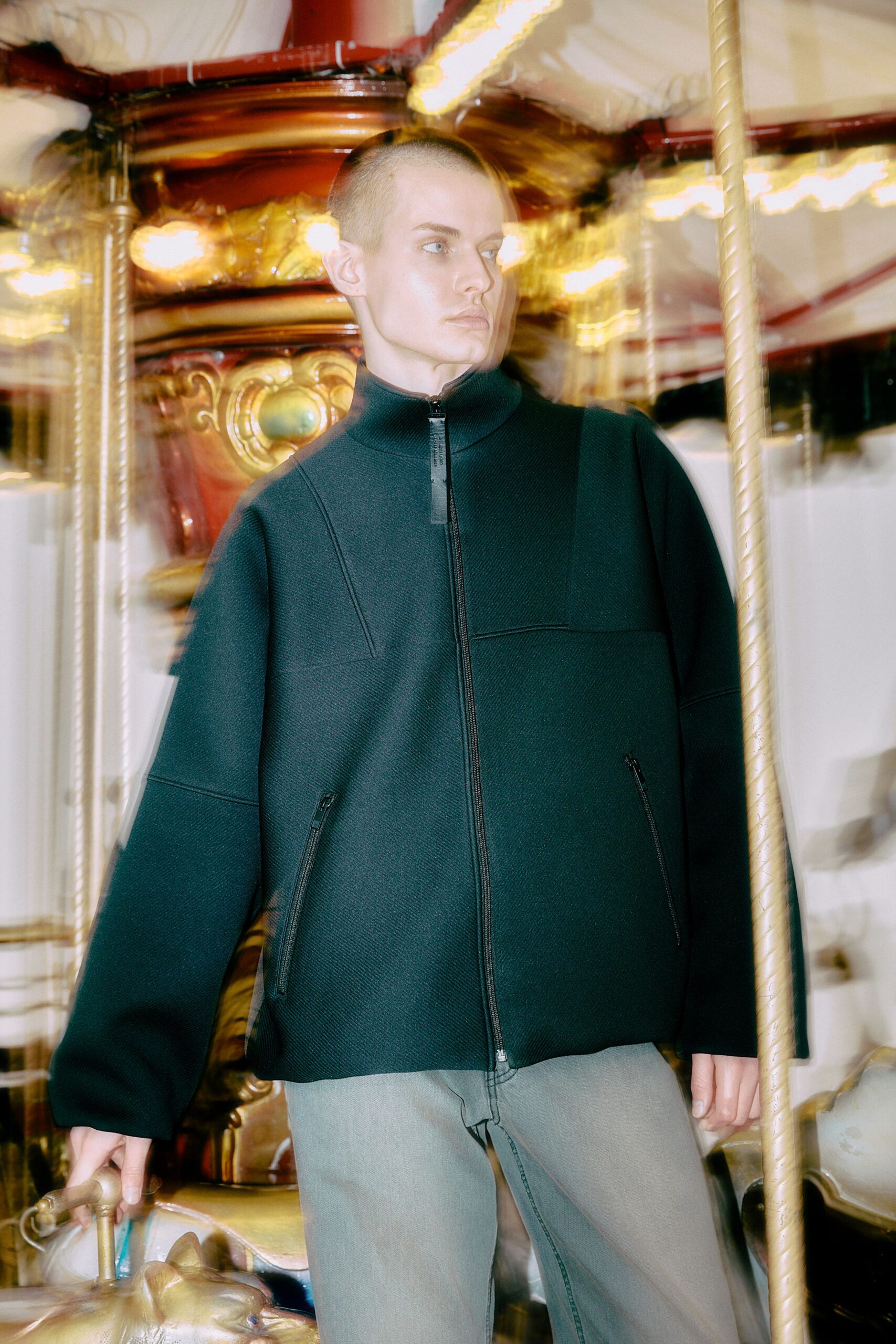 oversized black jacket and gray pants