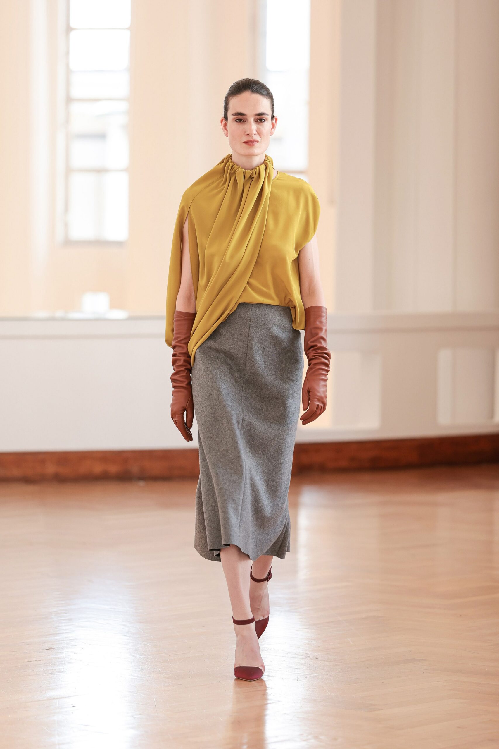yellow silk sleeveless high-neck fitted draped top
