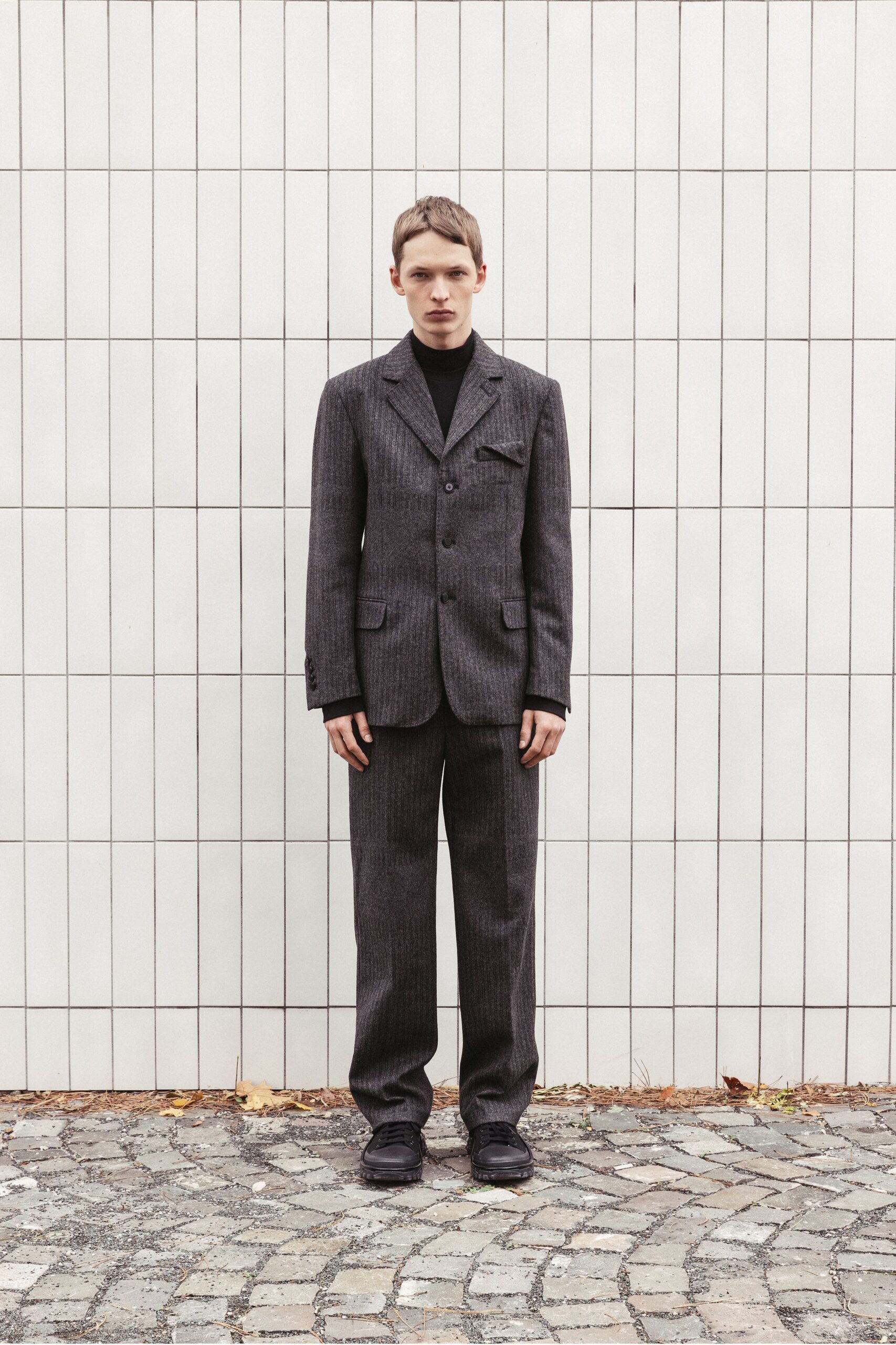 gray wool long-sleeve collared tailored striped buttoned suit