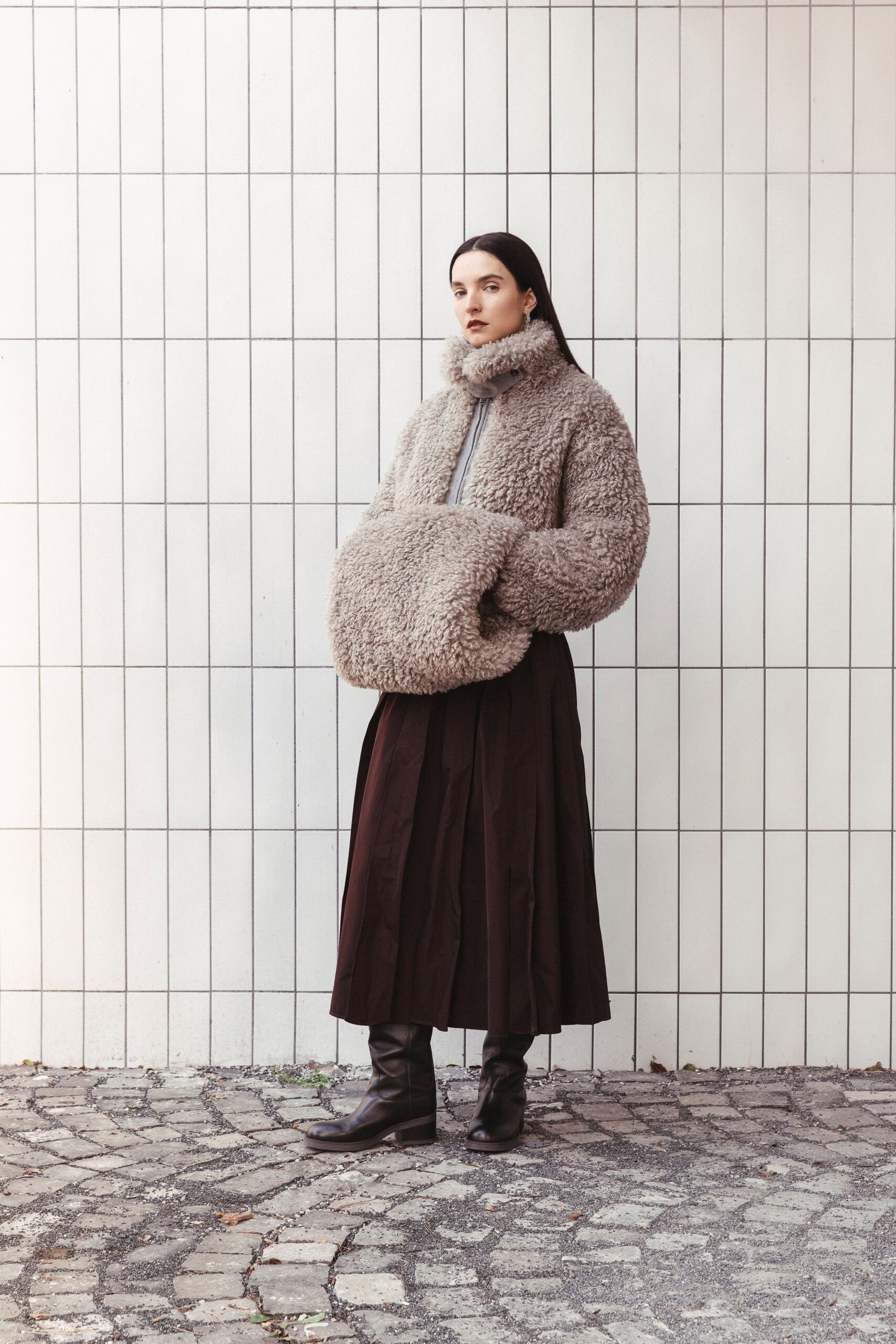 brown faux-fur coat with black skirt