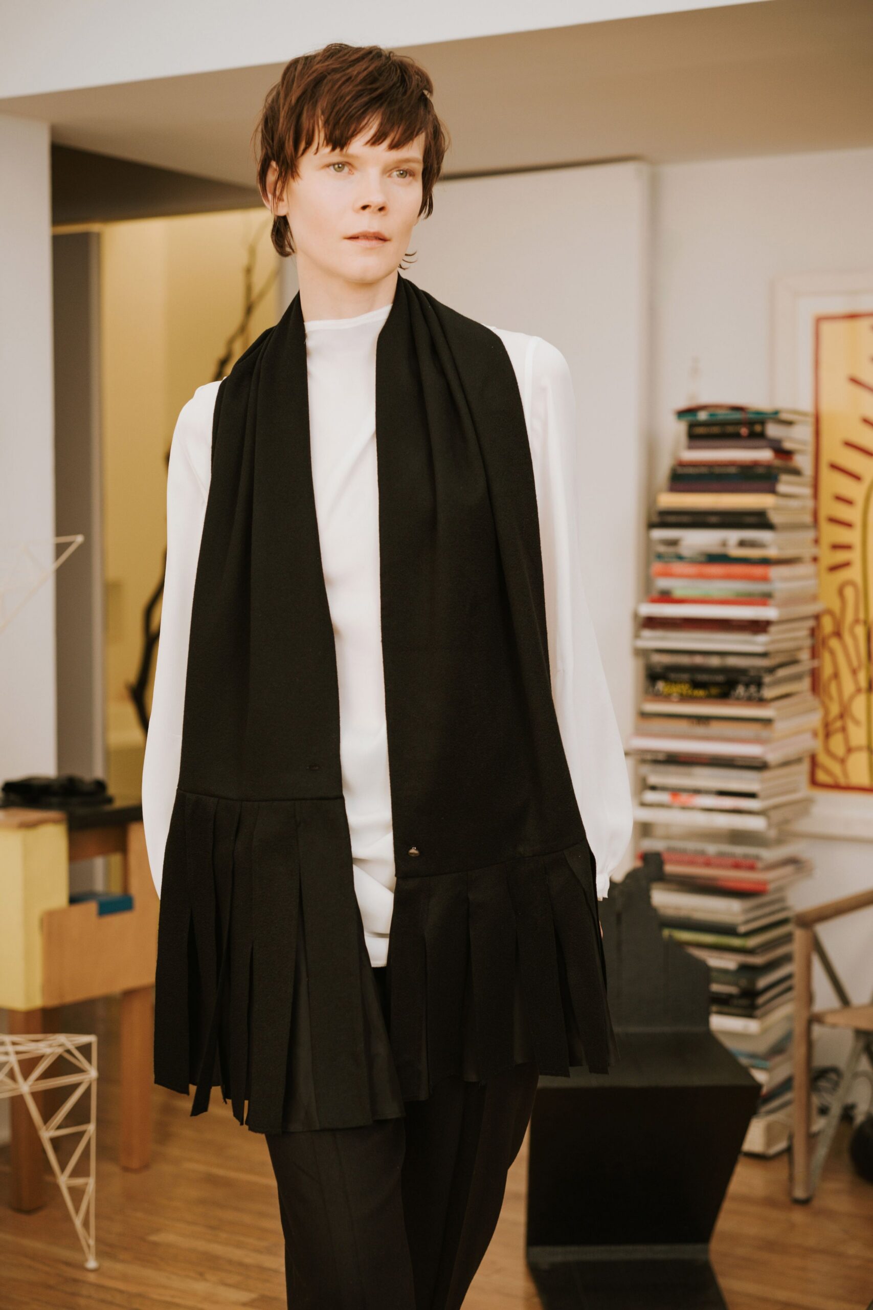 white fitted blouse with black pants