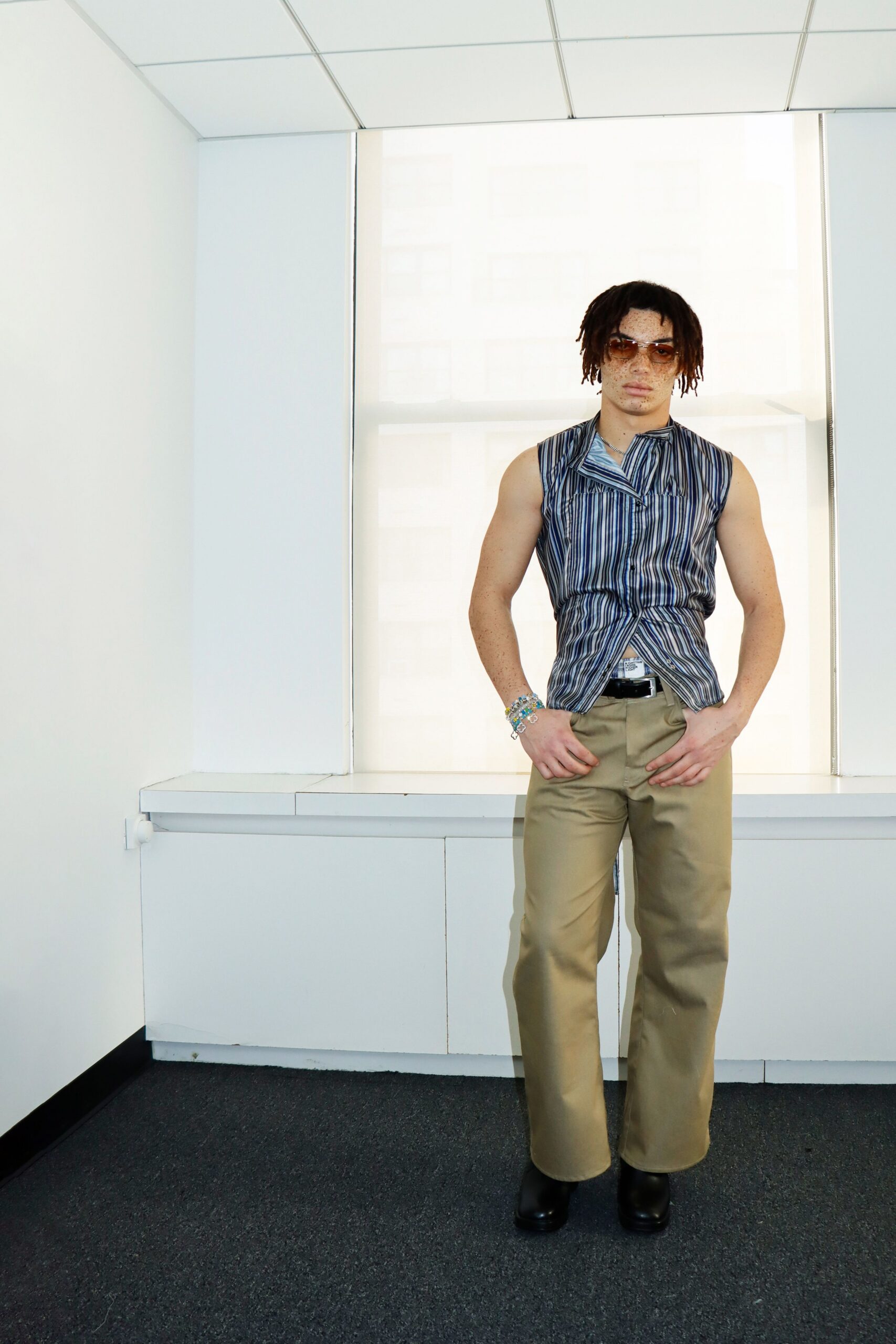 striped sleeveless shirt with wide-leg pants