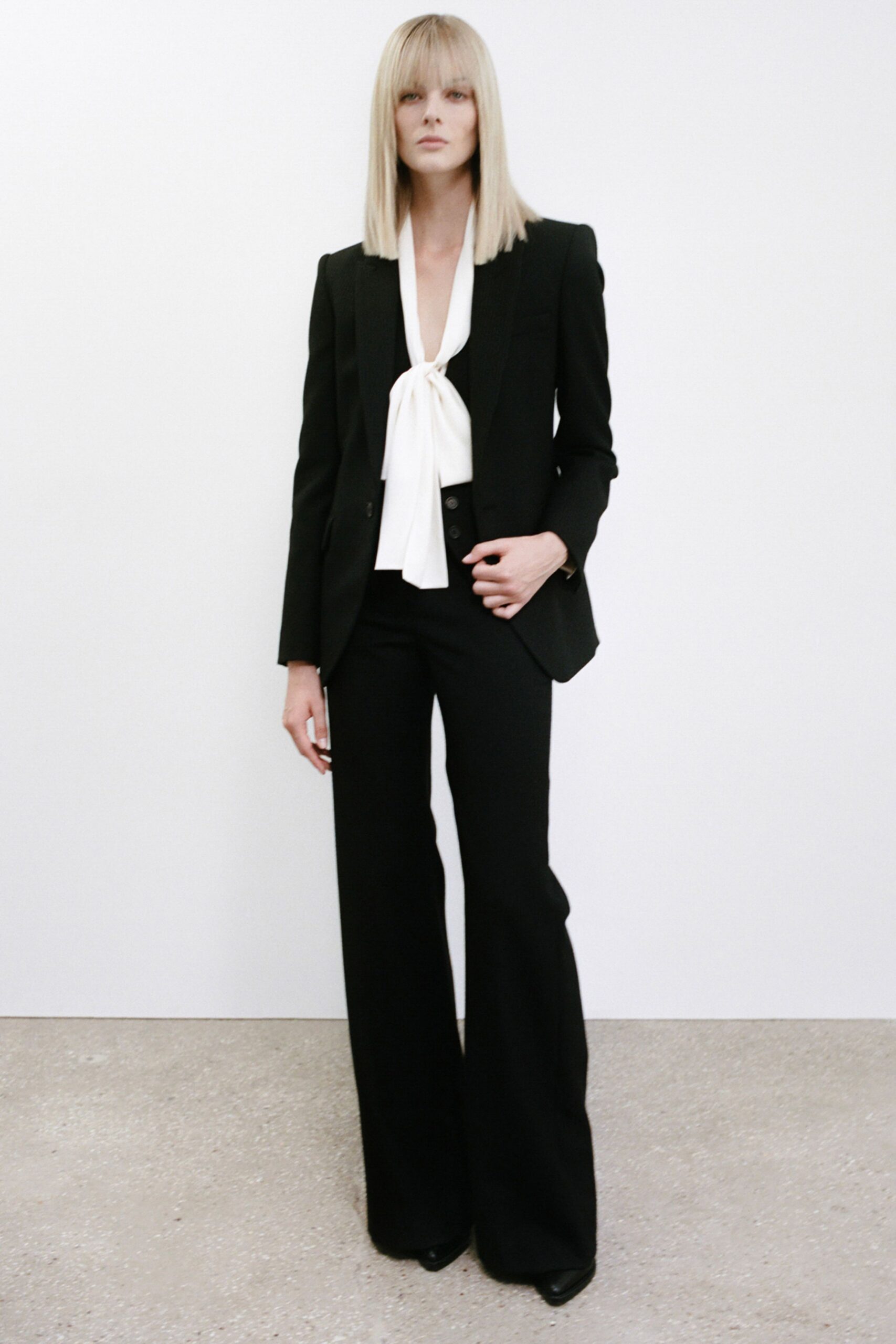 black fitted high-waisted flared pants
