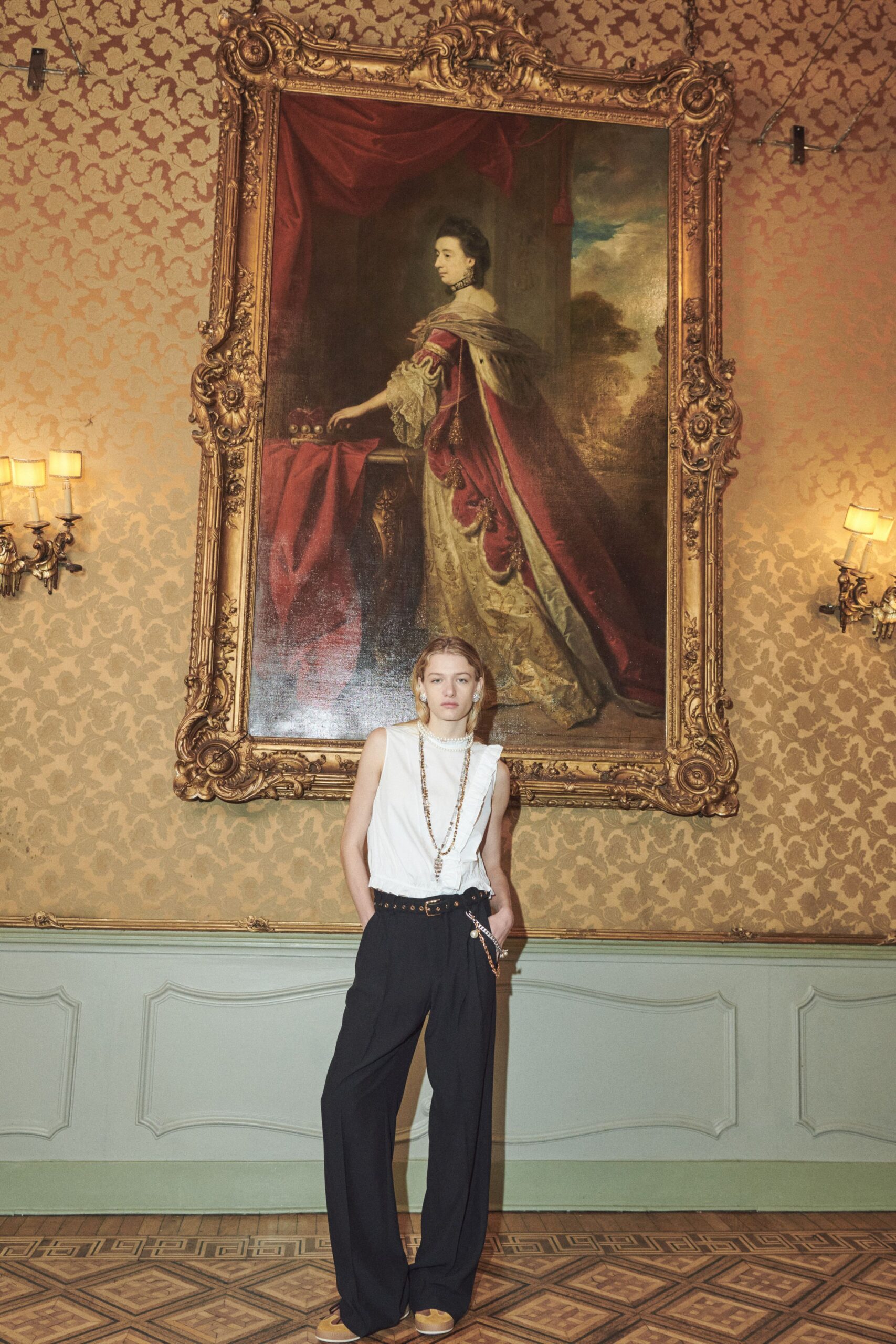 white sleeveless top with black pants