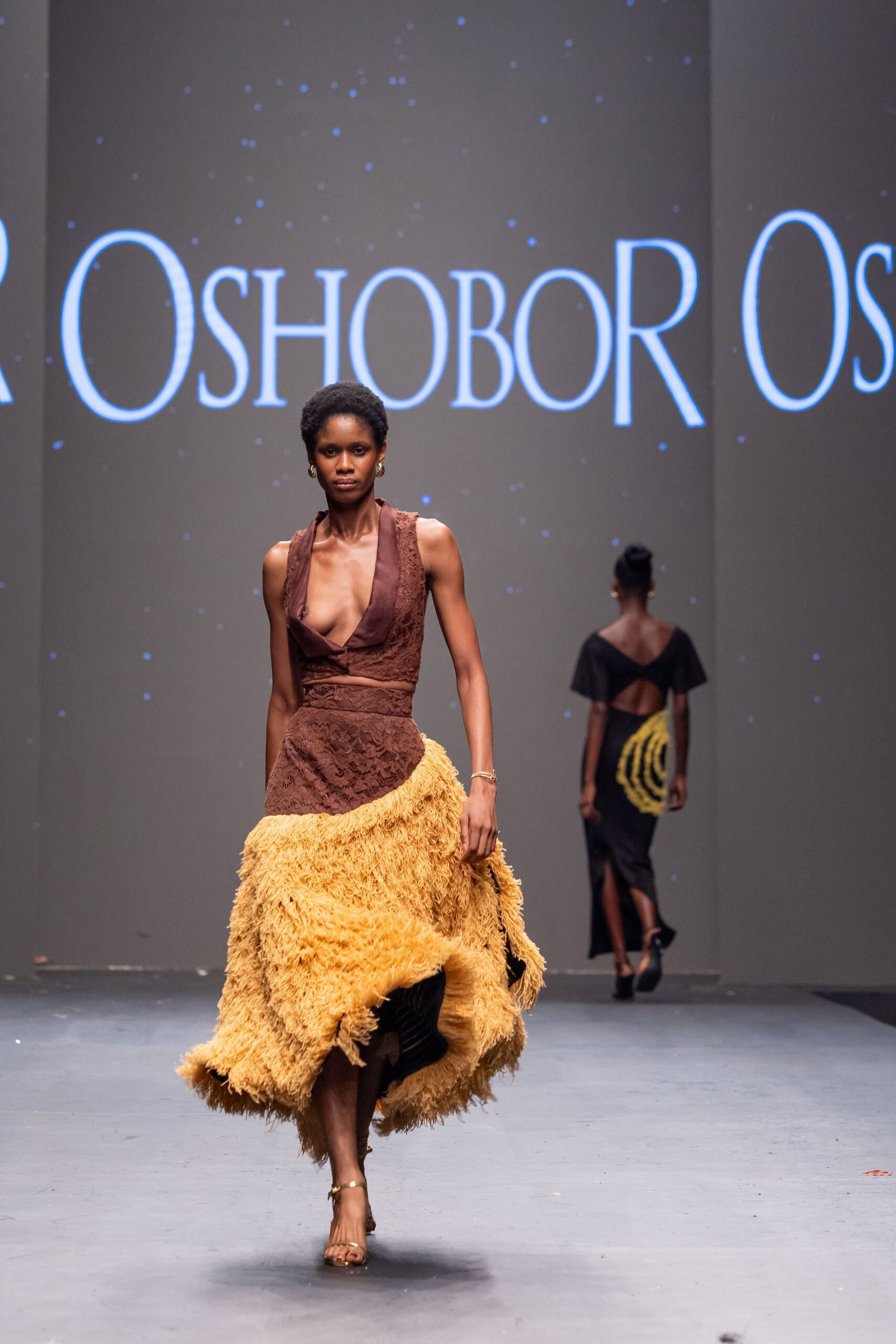 brown and yellow pleated dress
