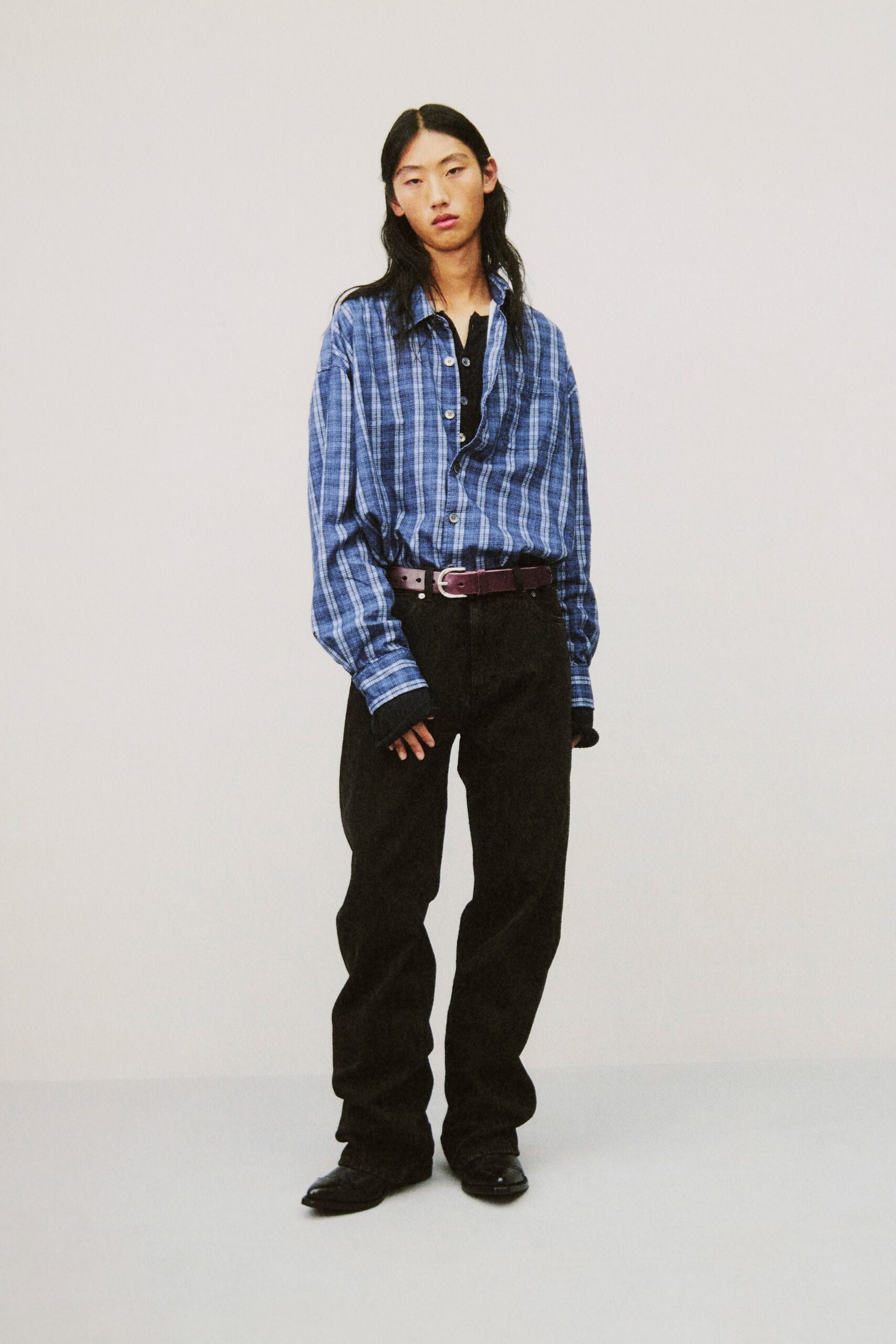 blue checked shirt black pants