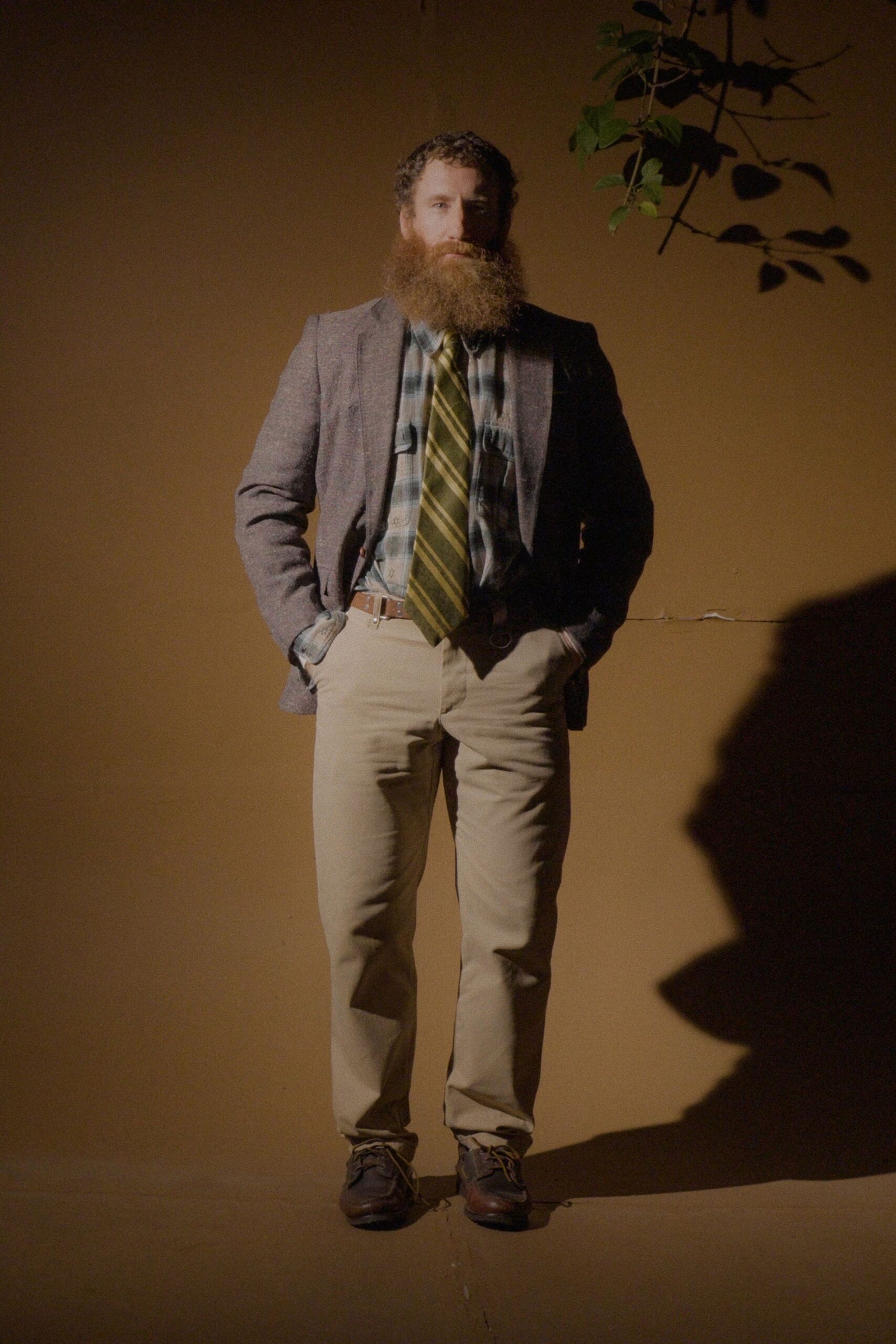 gray tailored blazer with checked shirt