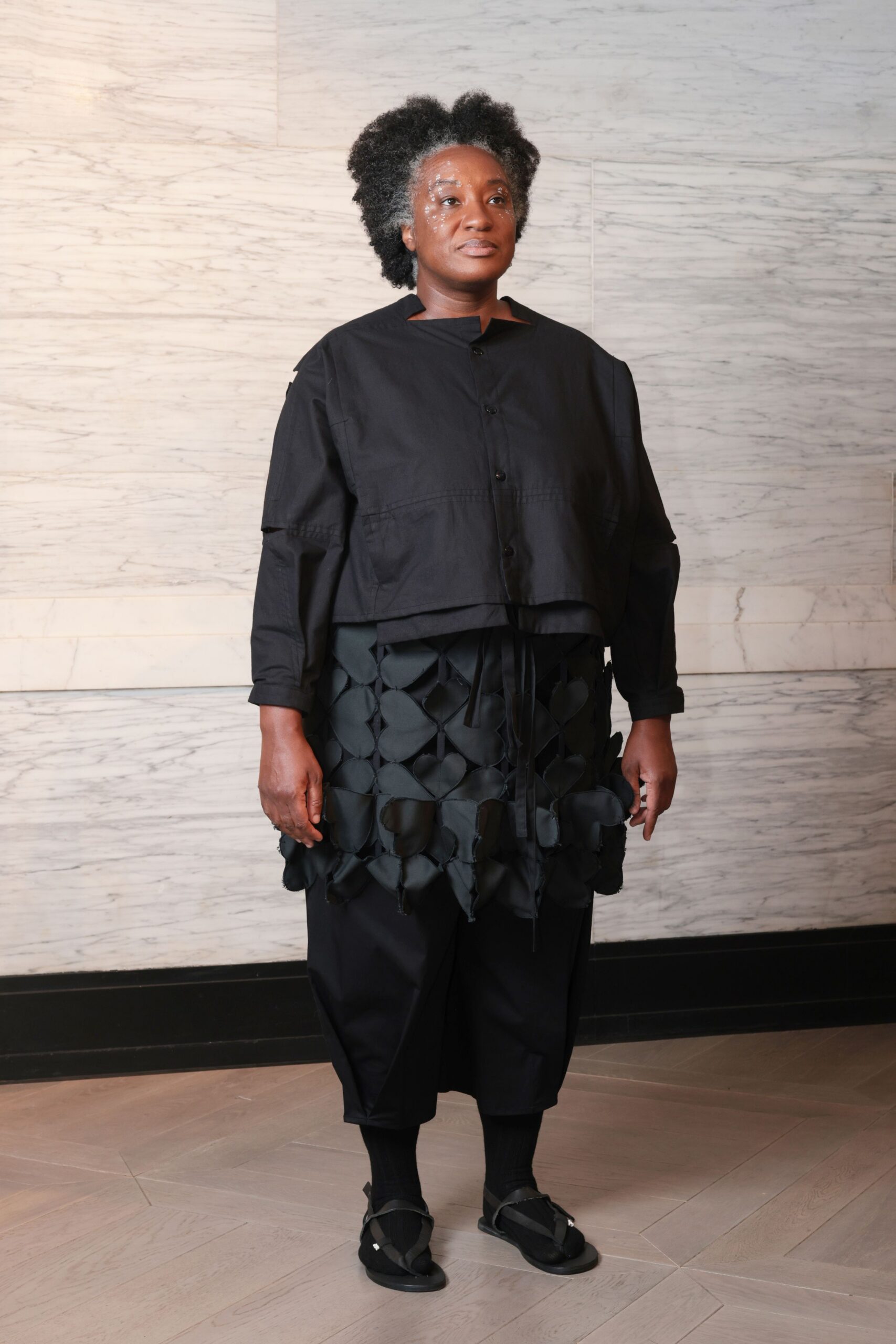 black relaxed jacket with layered skirt
