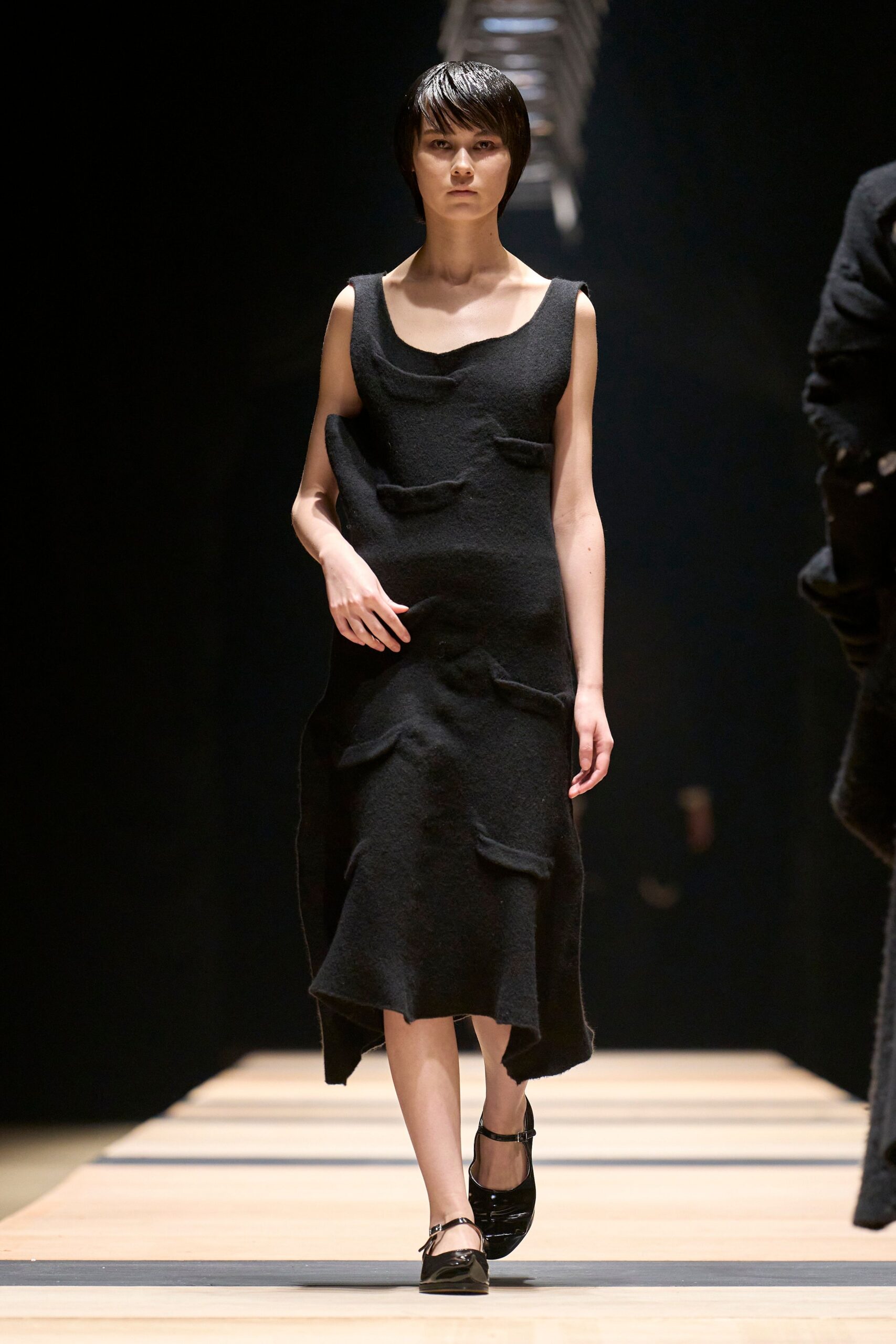 black wool sleeveless v-neck fitted draped midi dress