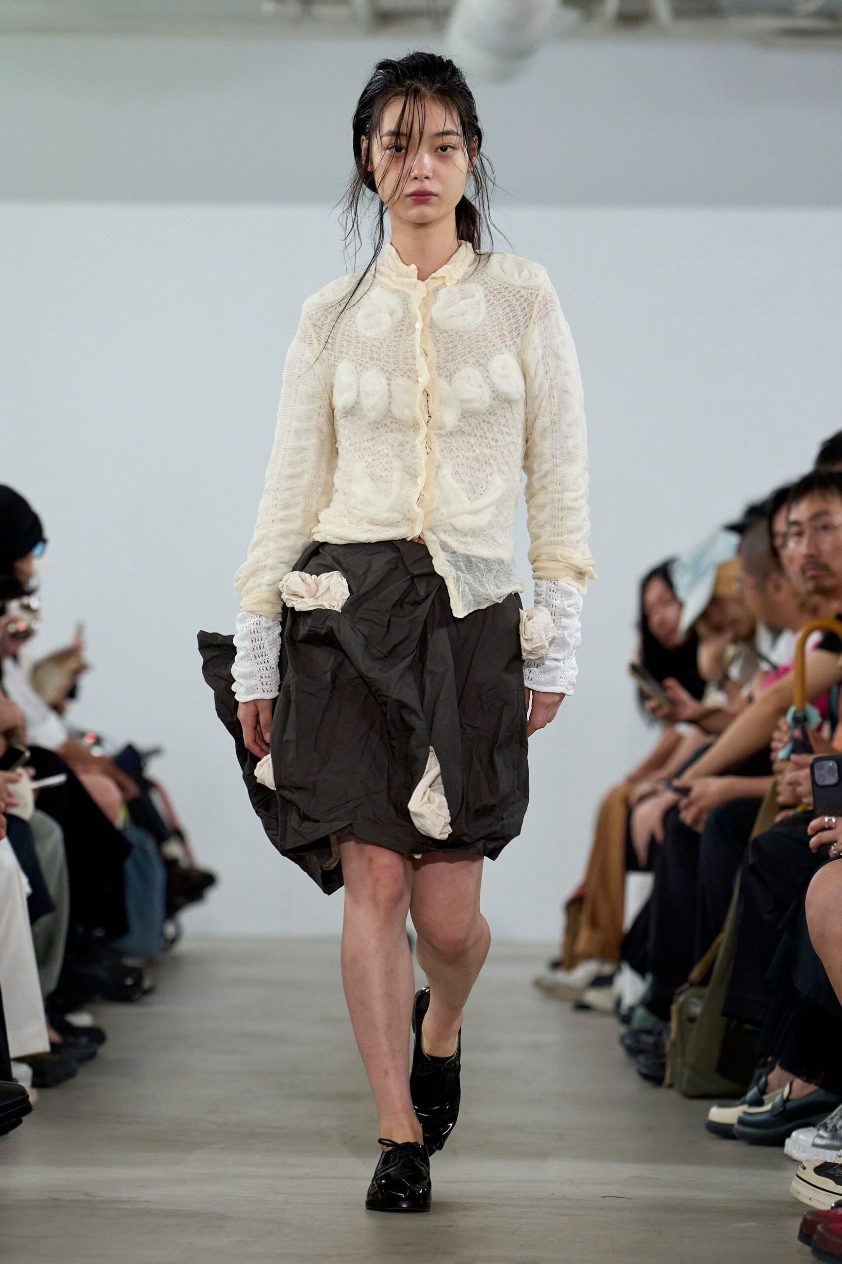 white relaxed shirt with black skirt