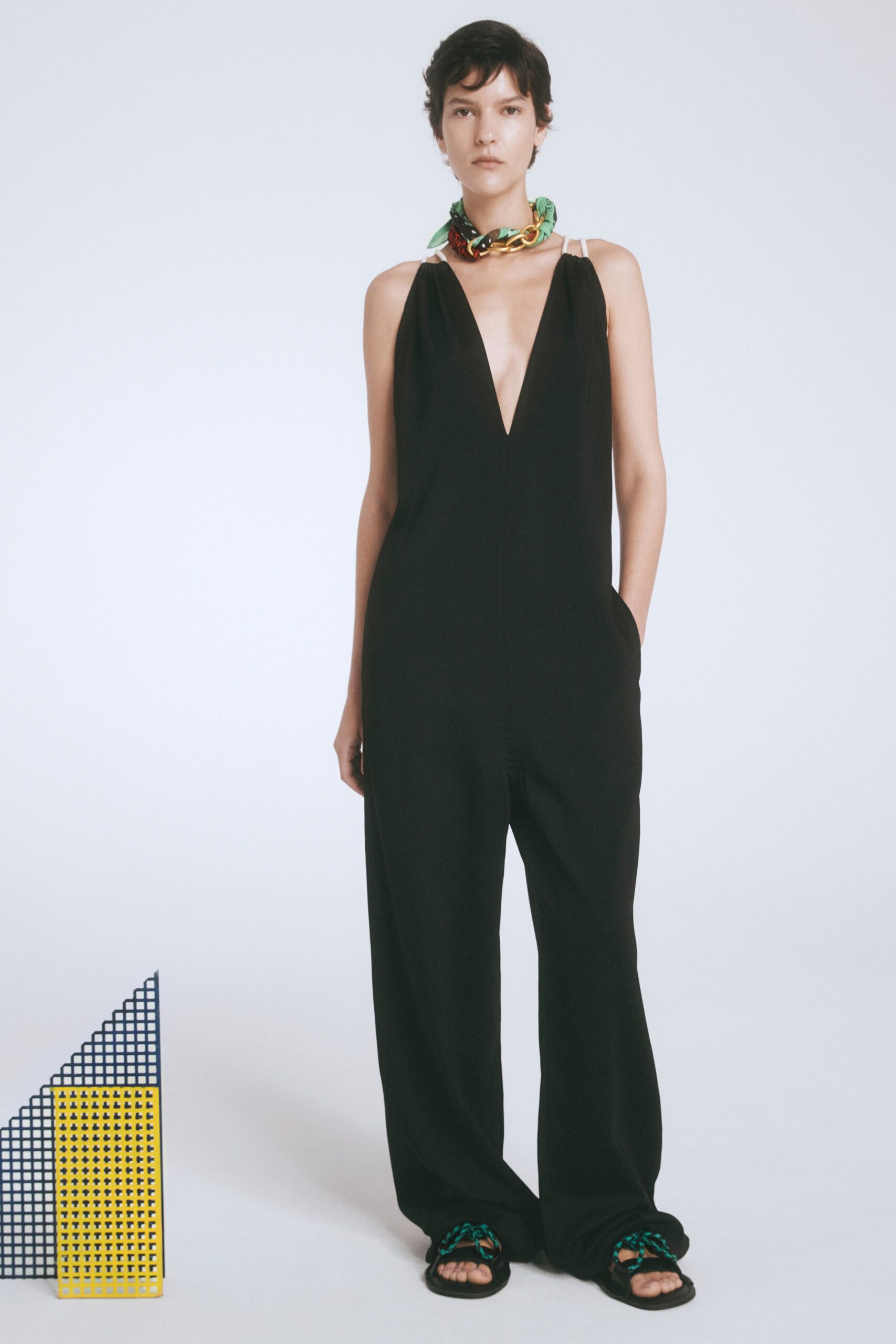 black cotton sleeveless v-neck relaxed pockets jumpsuit
