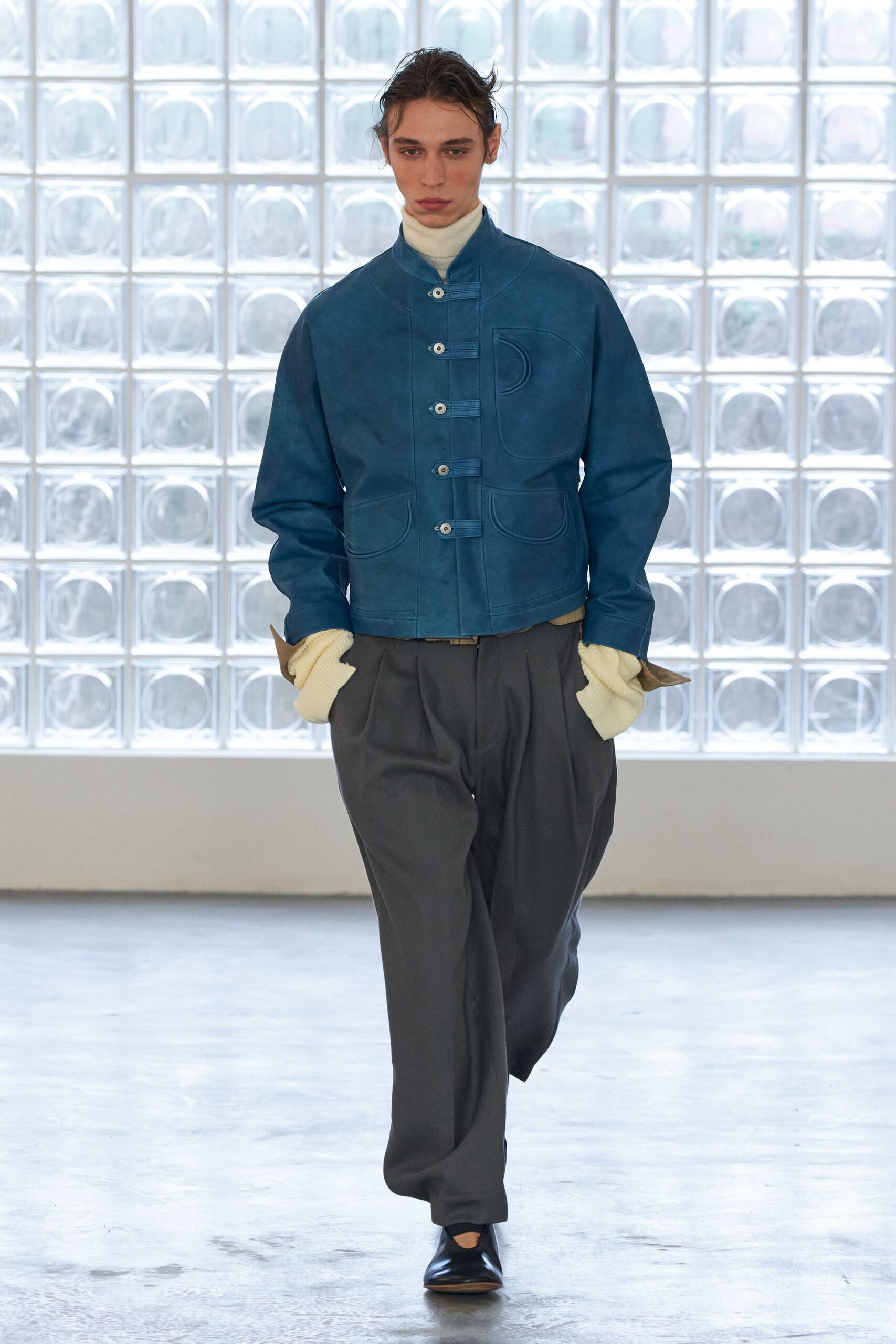 blue leather long-sleeve collared relaxed buttoned jacket