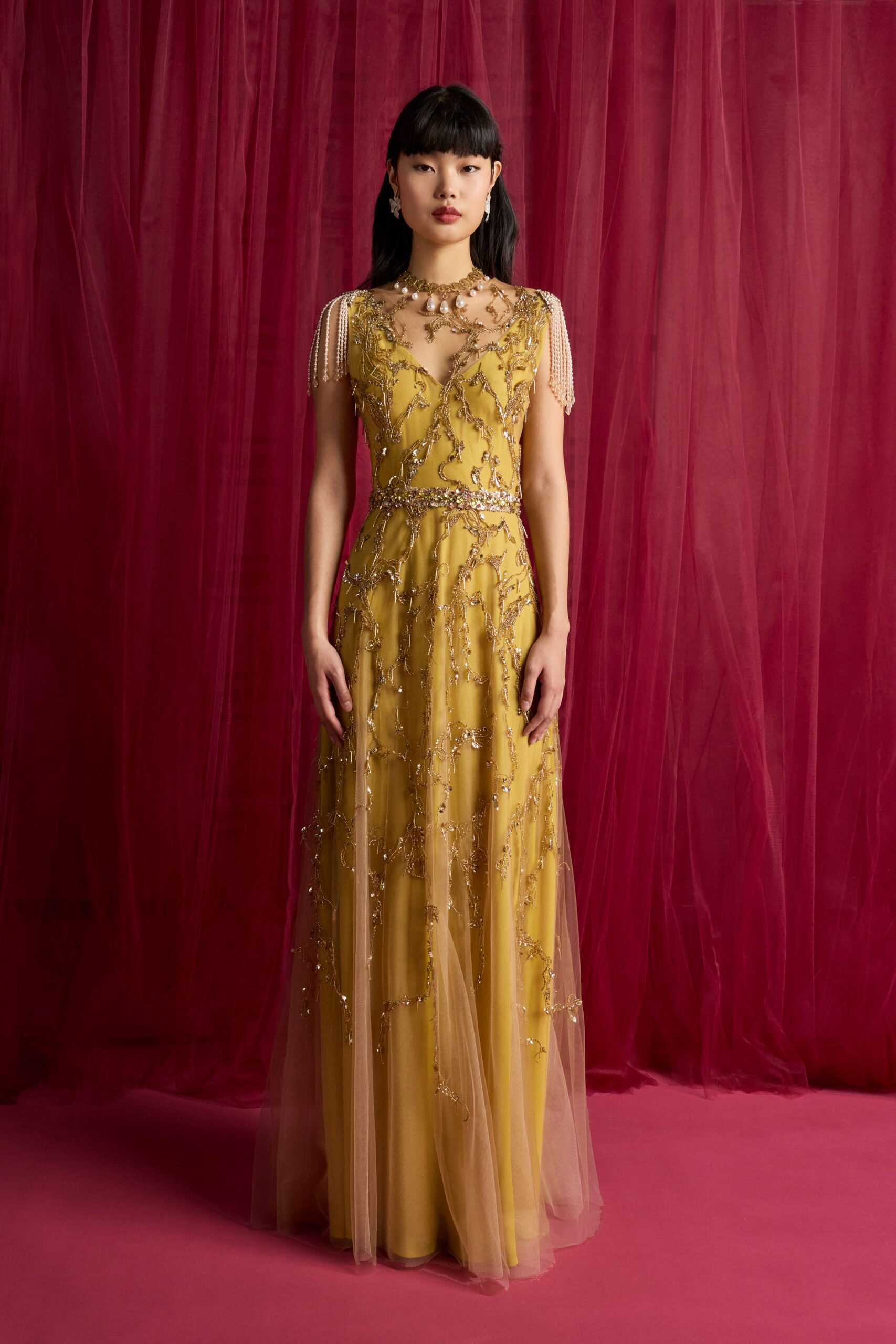 yellow embellished sleeveless gown