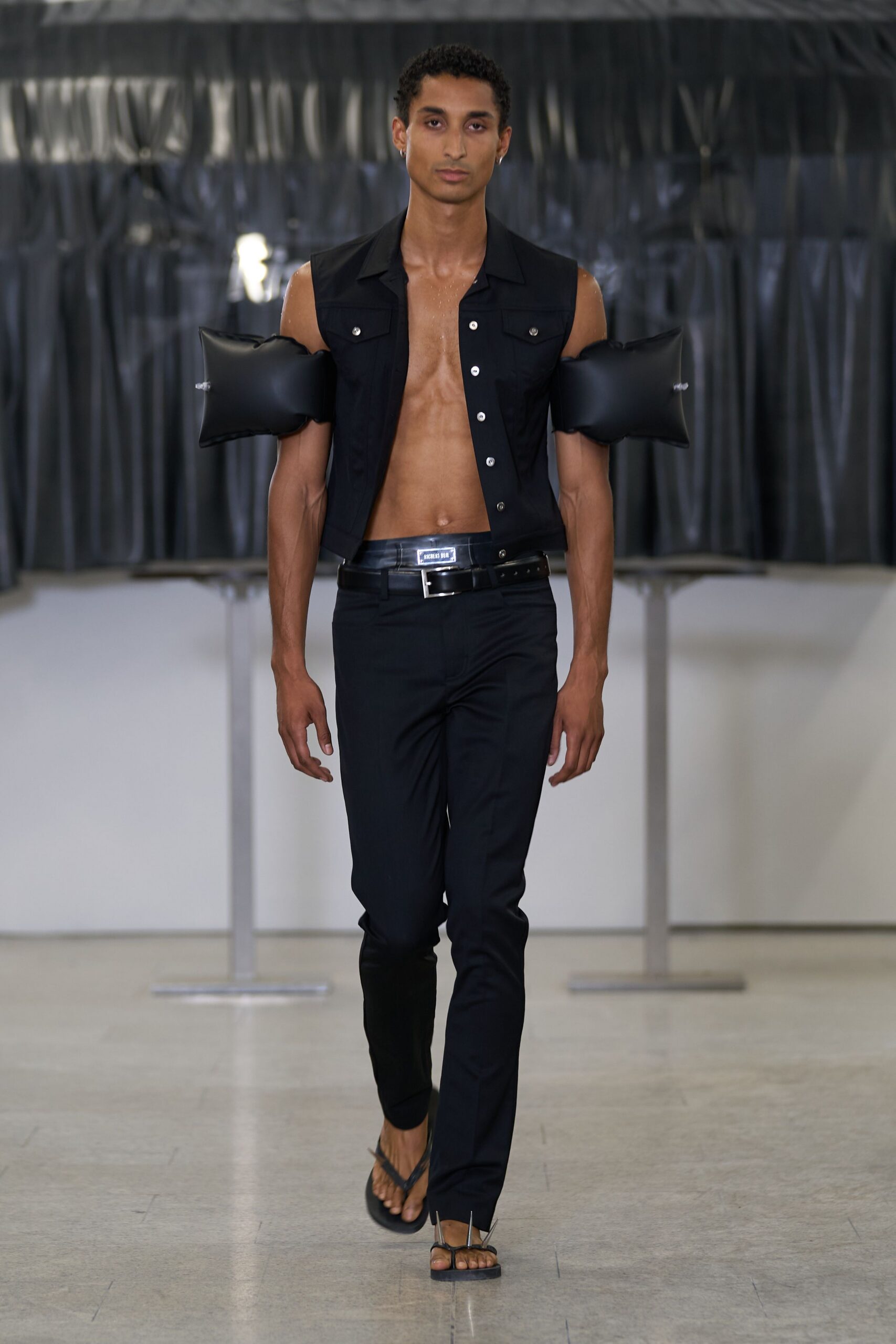 black fitted vest and pants