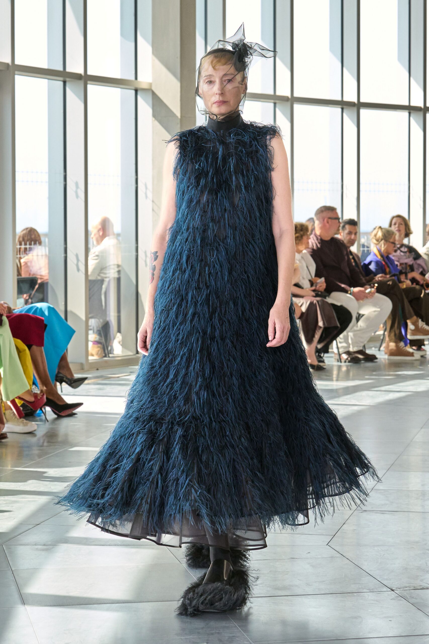 blue fringed maxi dress with fur shoes