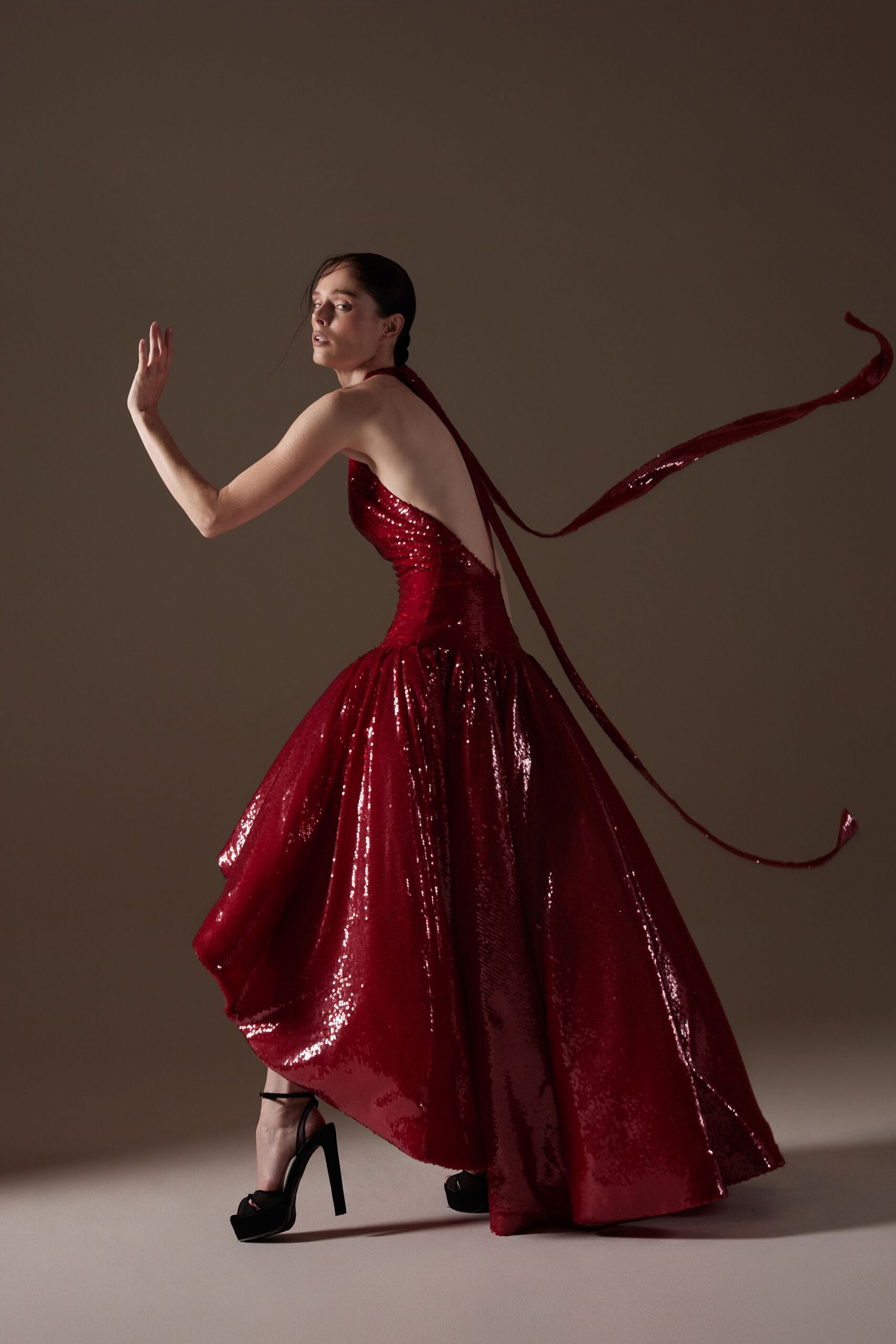 red sequin sleeveless backless fitted draped shiny gown