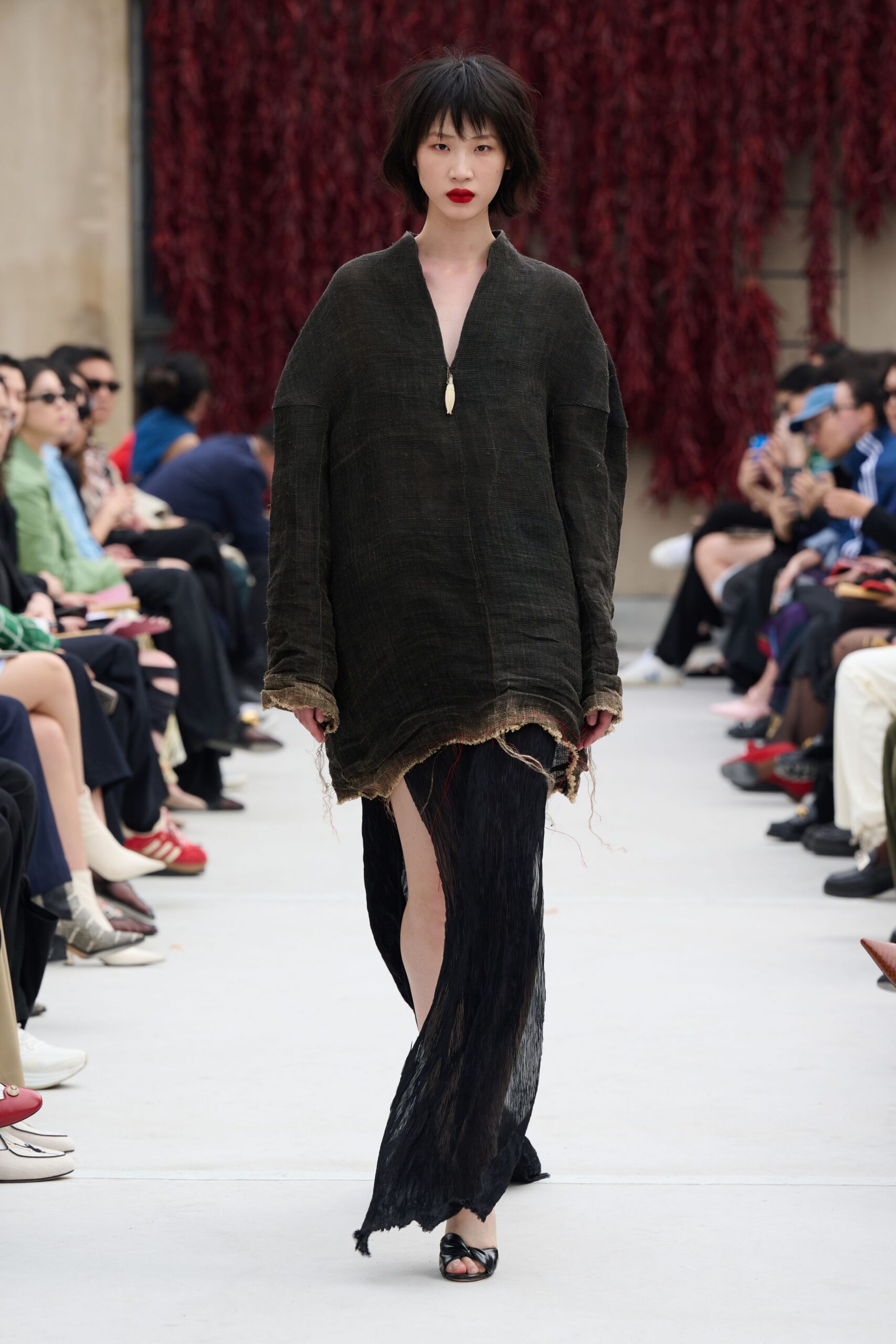 black oversized top with draped skirt