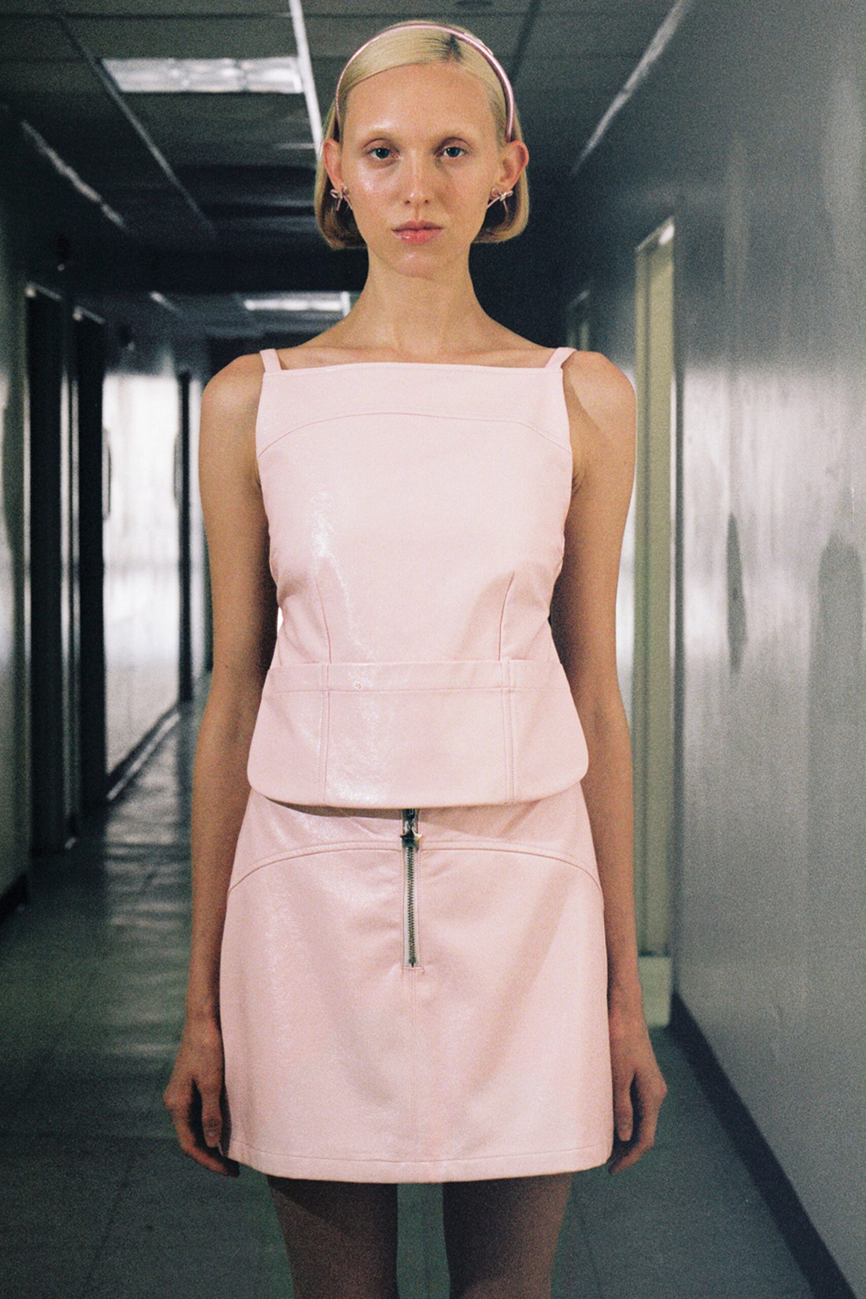 pink leather sleeveless square-neck fitted zippered shiny top