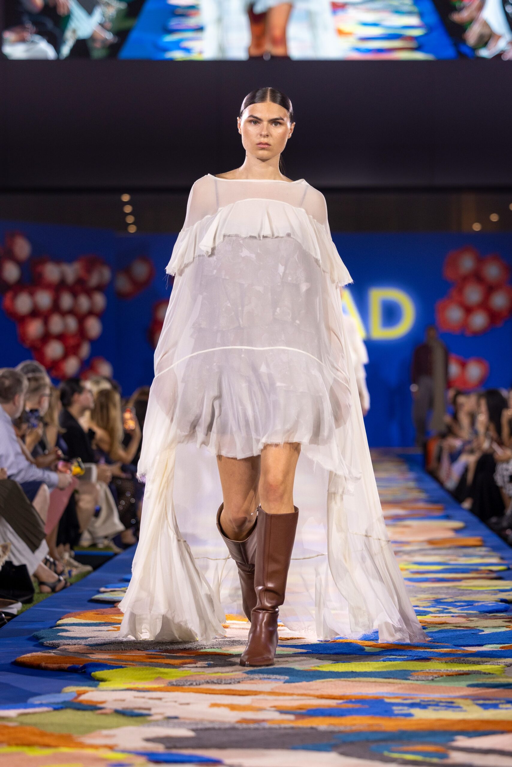 white ruffled maxi dress with brown boots