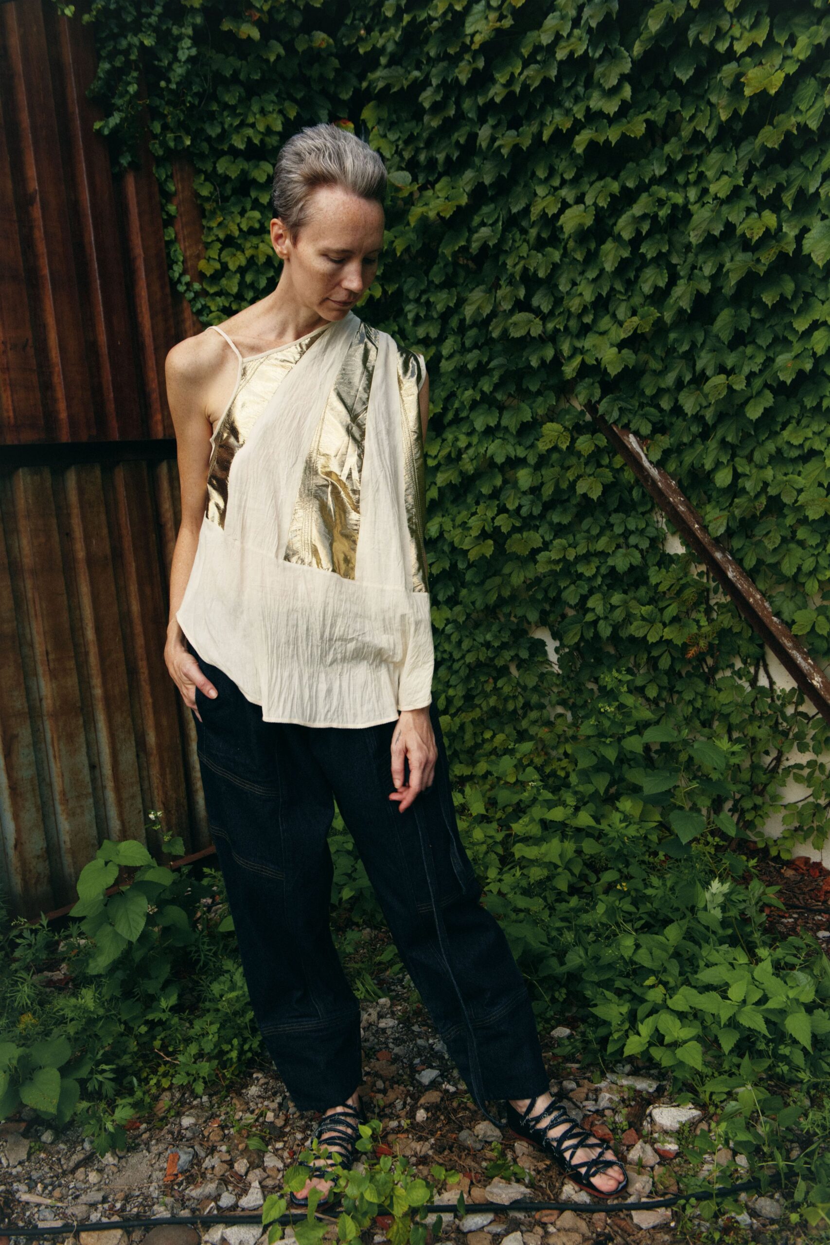 gold silk sleeveless asymmetric fitted draped top