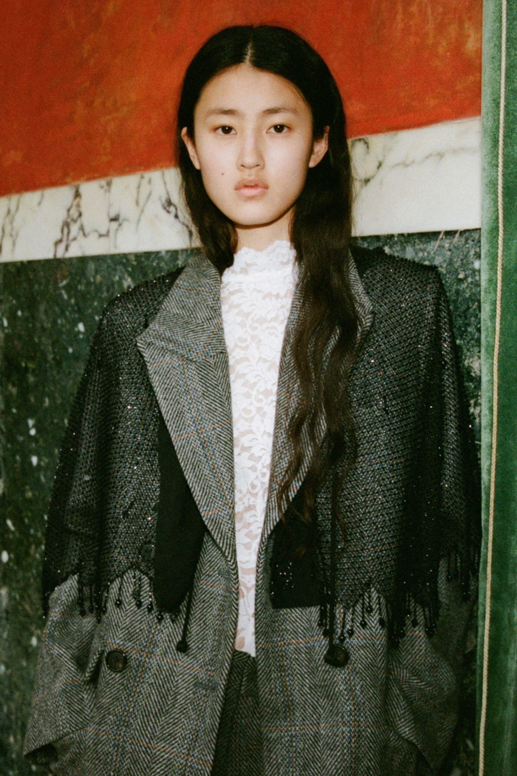 black gray relaxed coat and white lace blouse