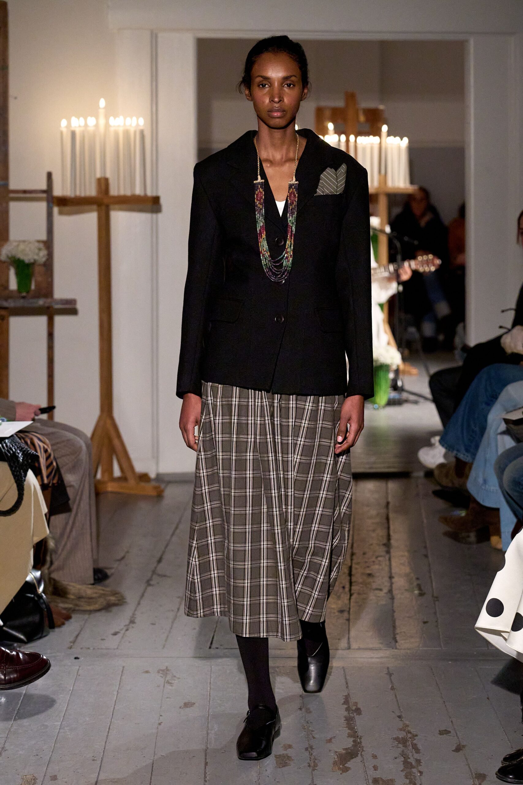 black blazer gray plaid skirt