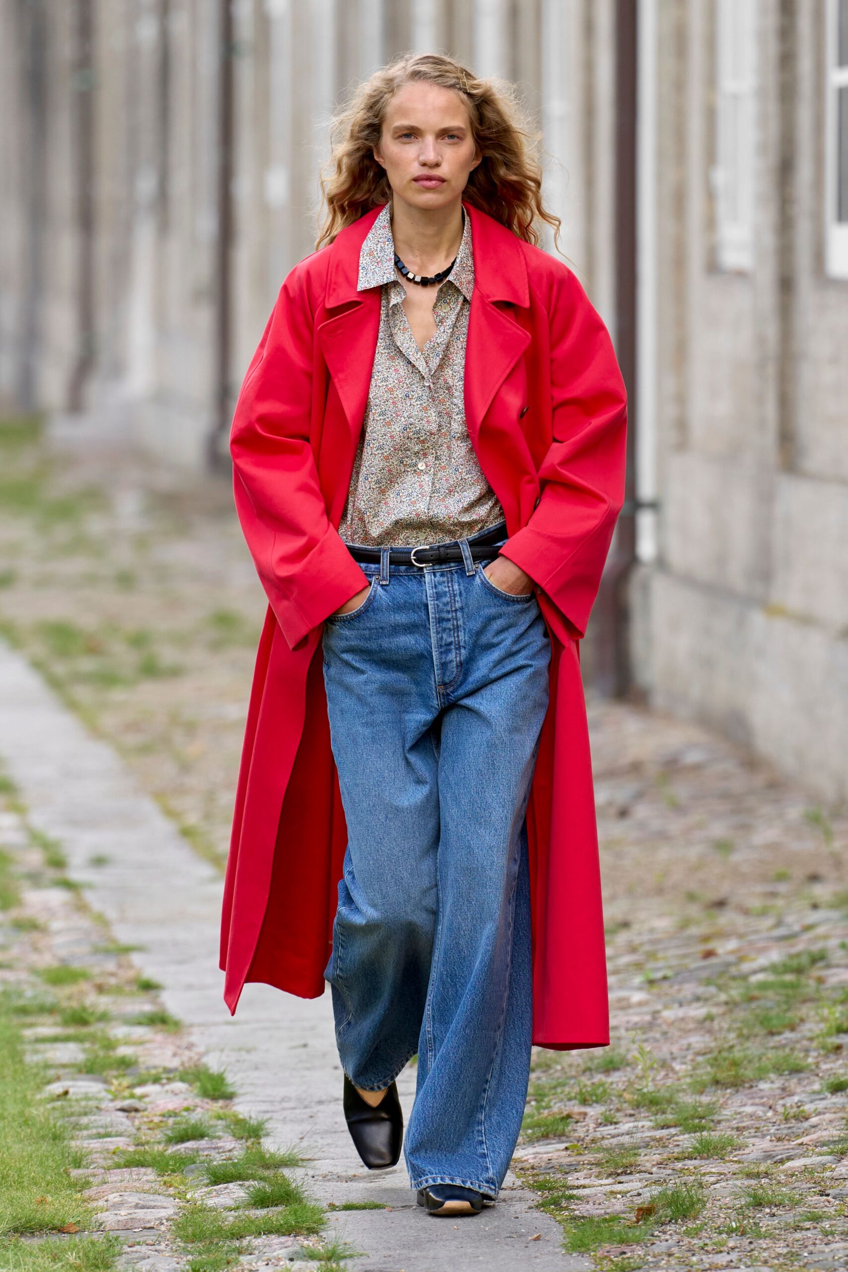 red coat with multi shirt