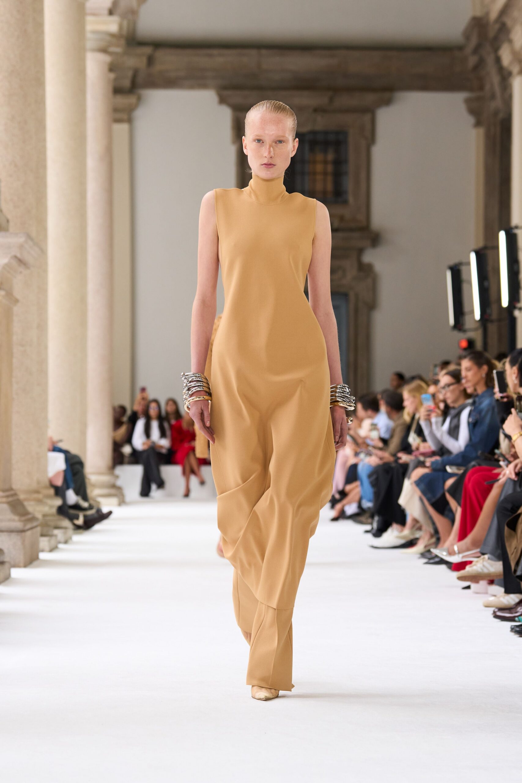 beige fitted sleeveless gown