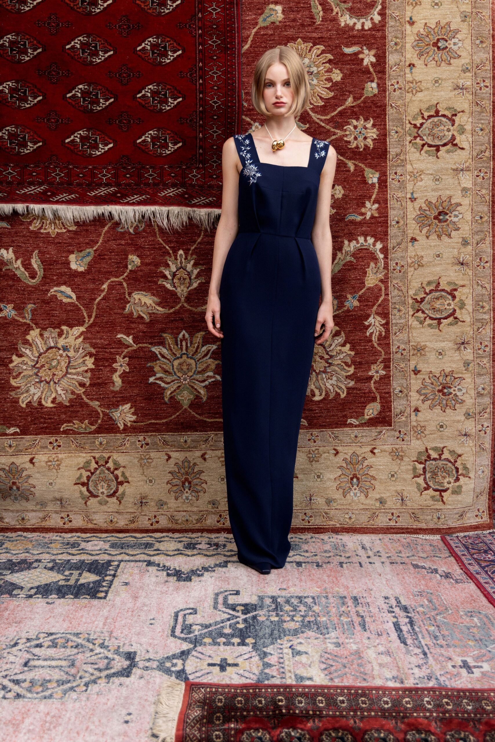blue silk sleeveless gown