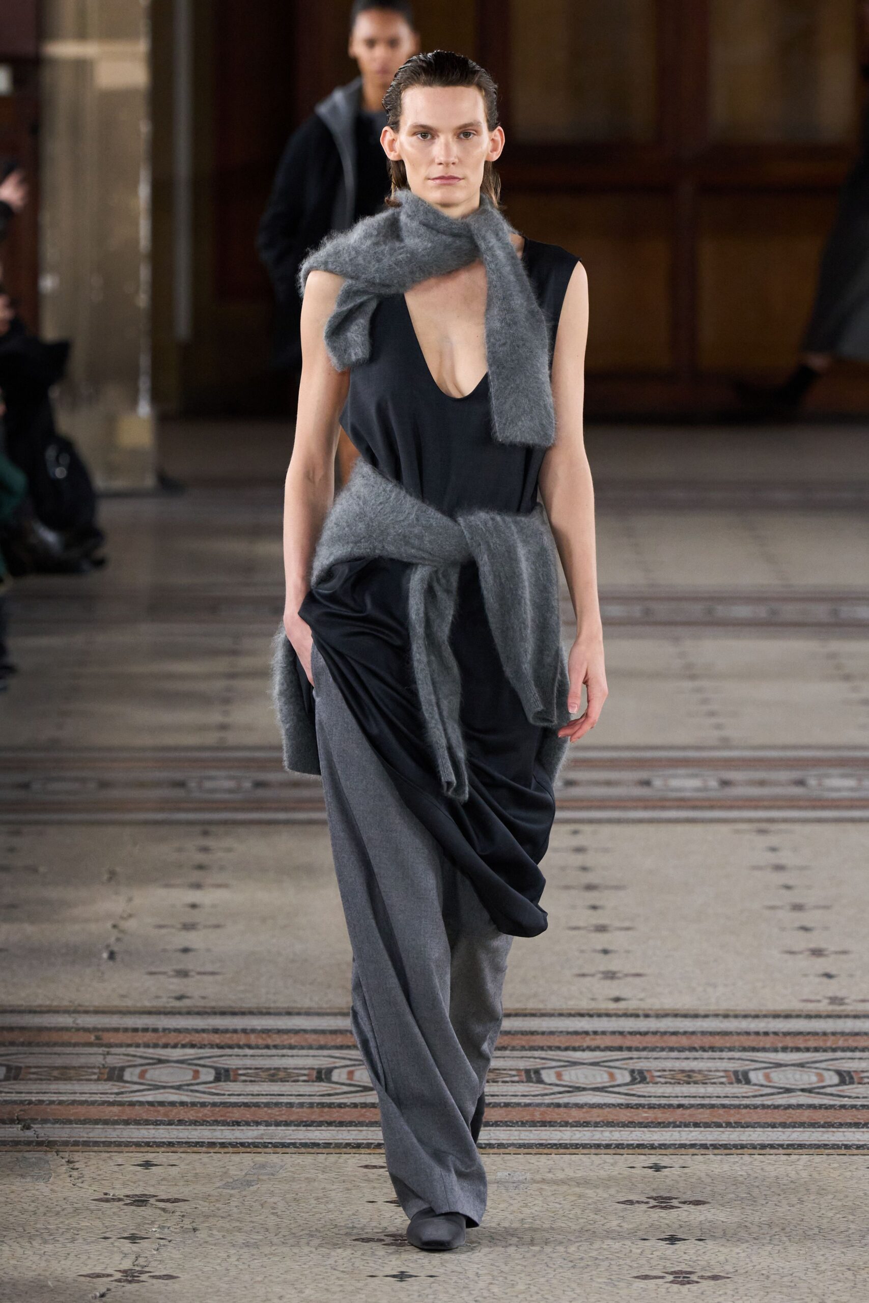 black fitted dress with gray sweater