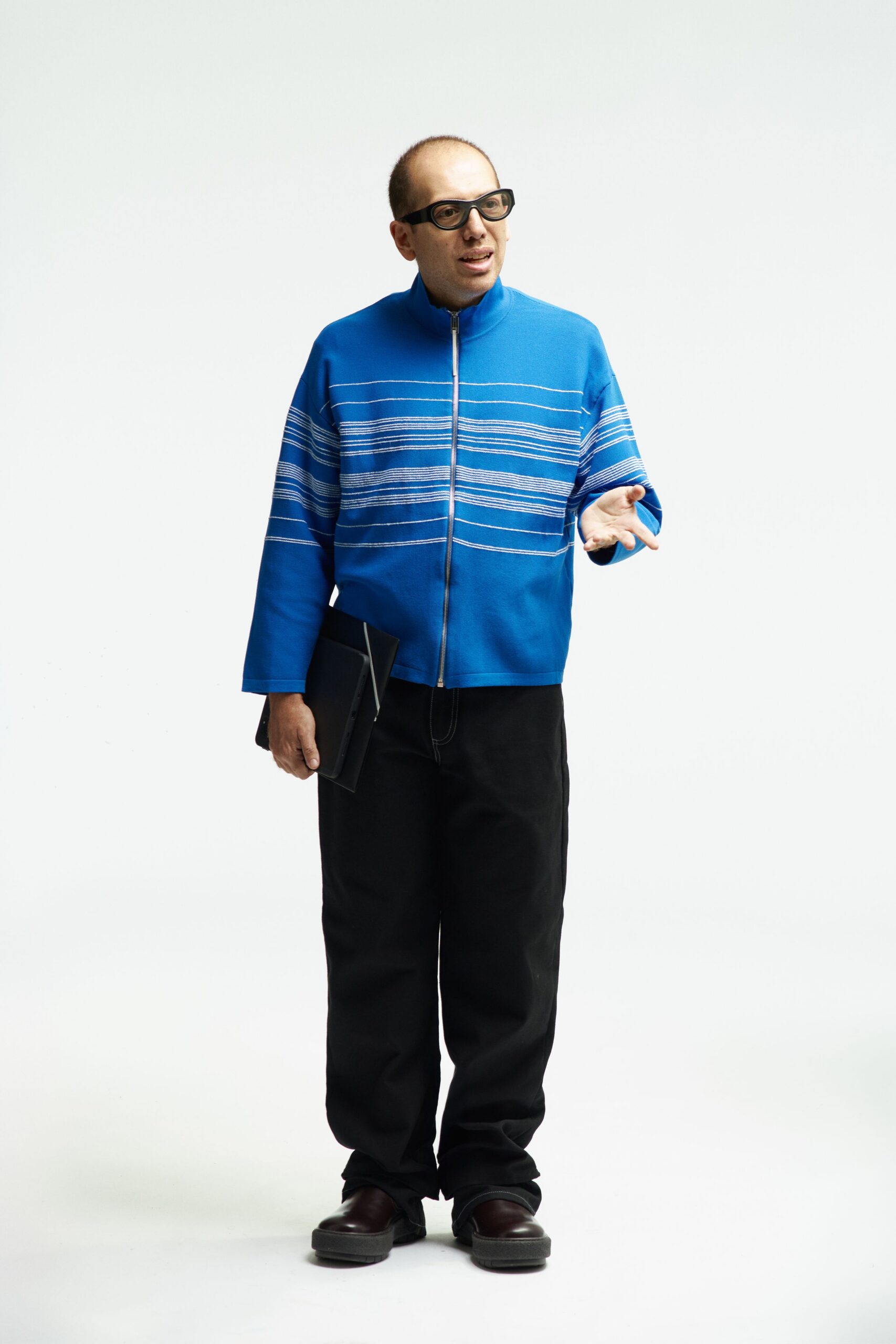 blue relaxed jacket with black pants