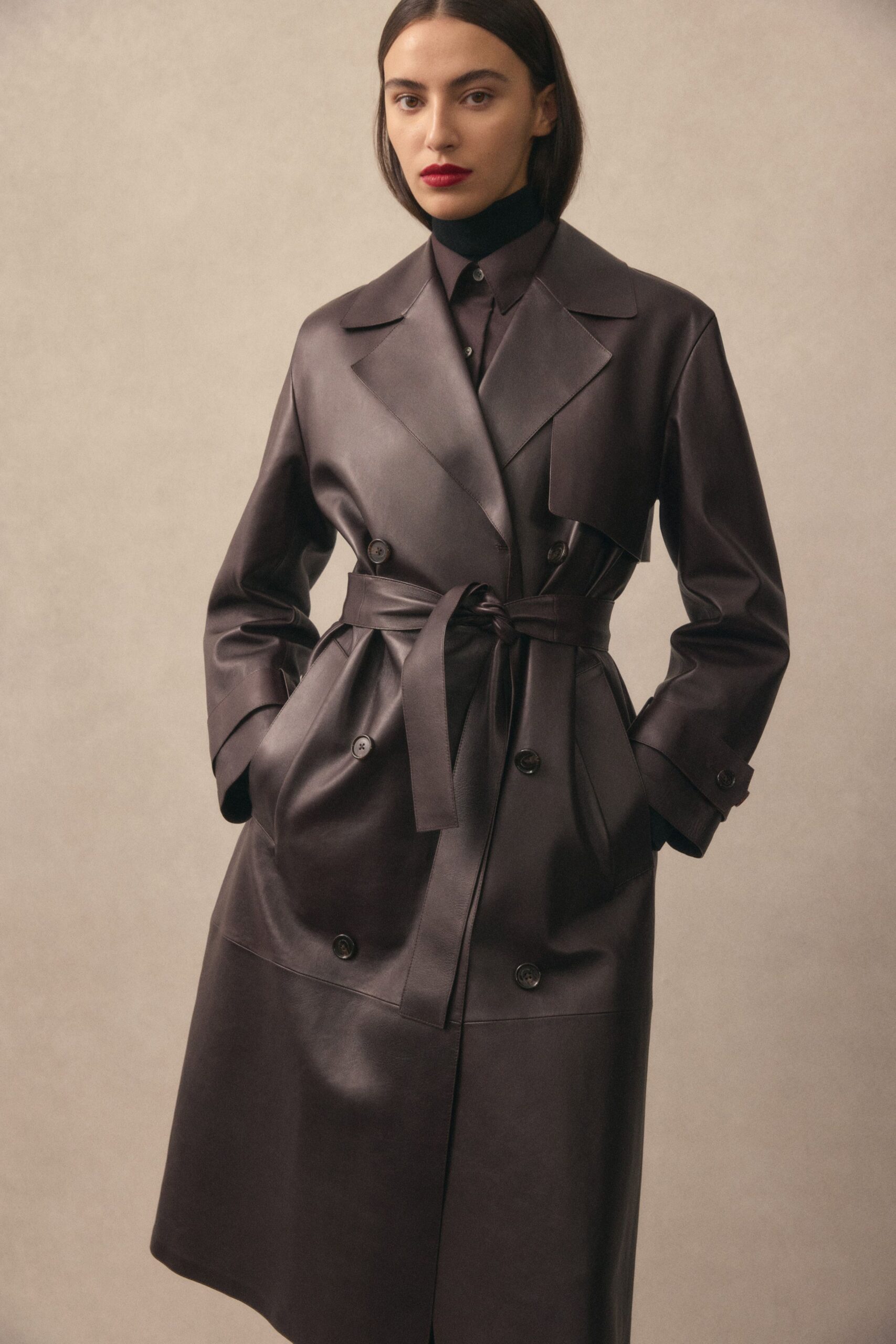 black leather long-sleeve collared fitted belted midi coat