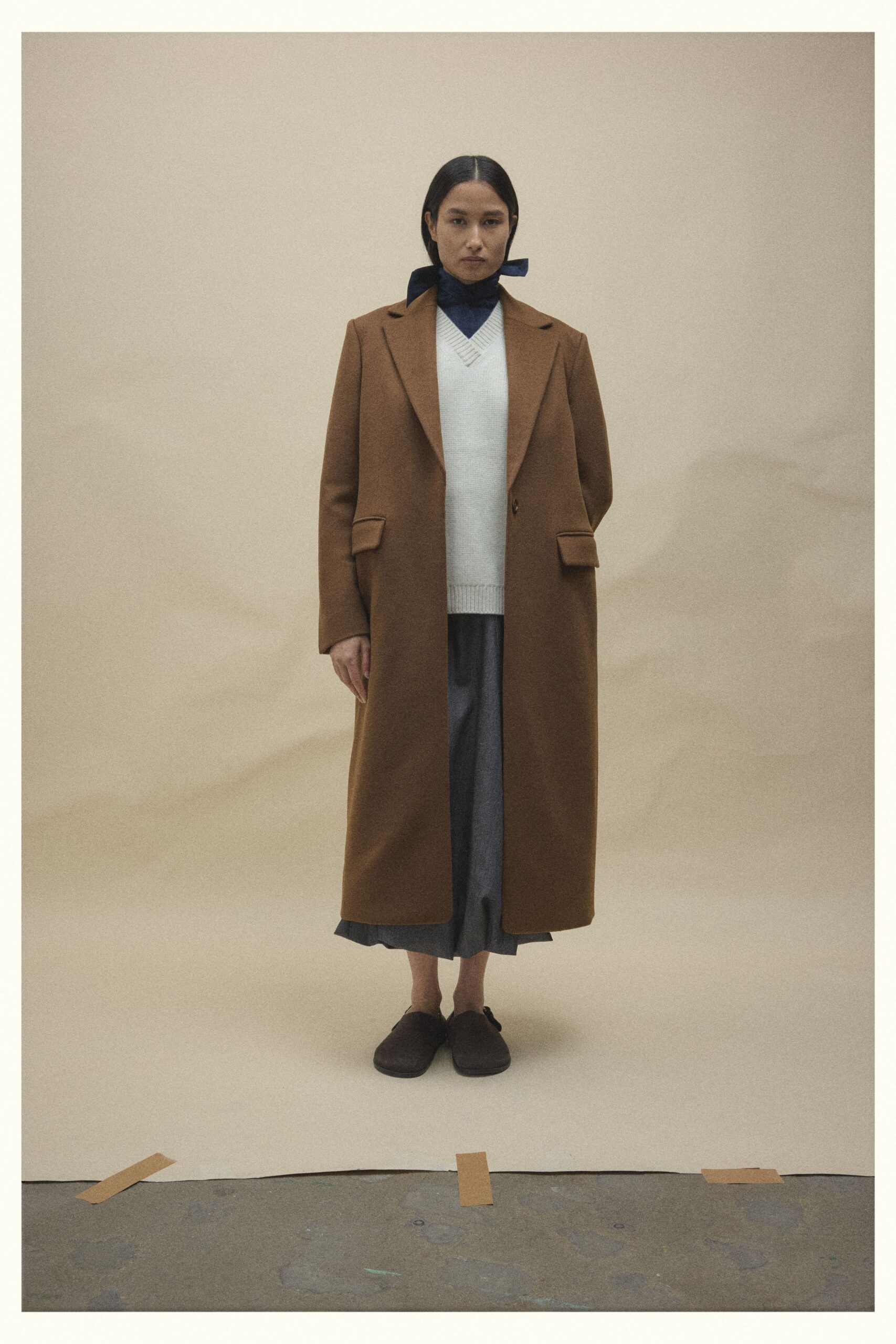 brown wool coat with gray skirt